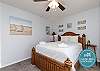 Third bedroom with queen size bed, shared balcony and flat screen TV