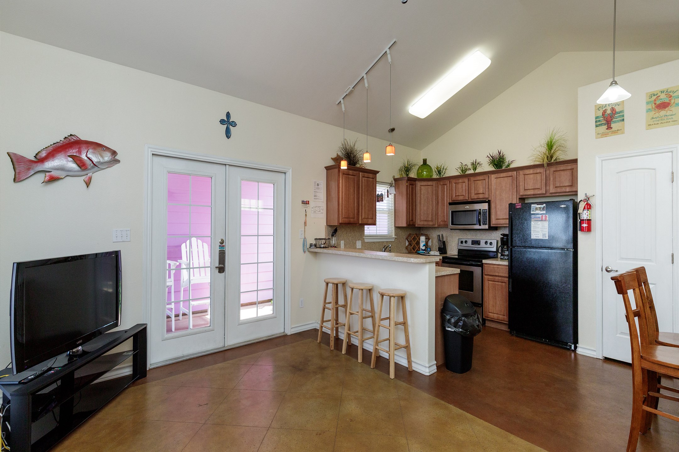 Inviting family hub with seamlessly integrated kitchen, dining, and living areas, perfect for creating lasting memories