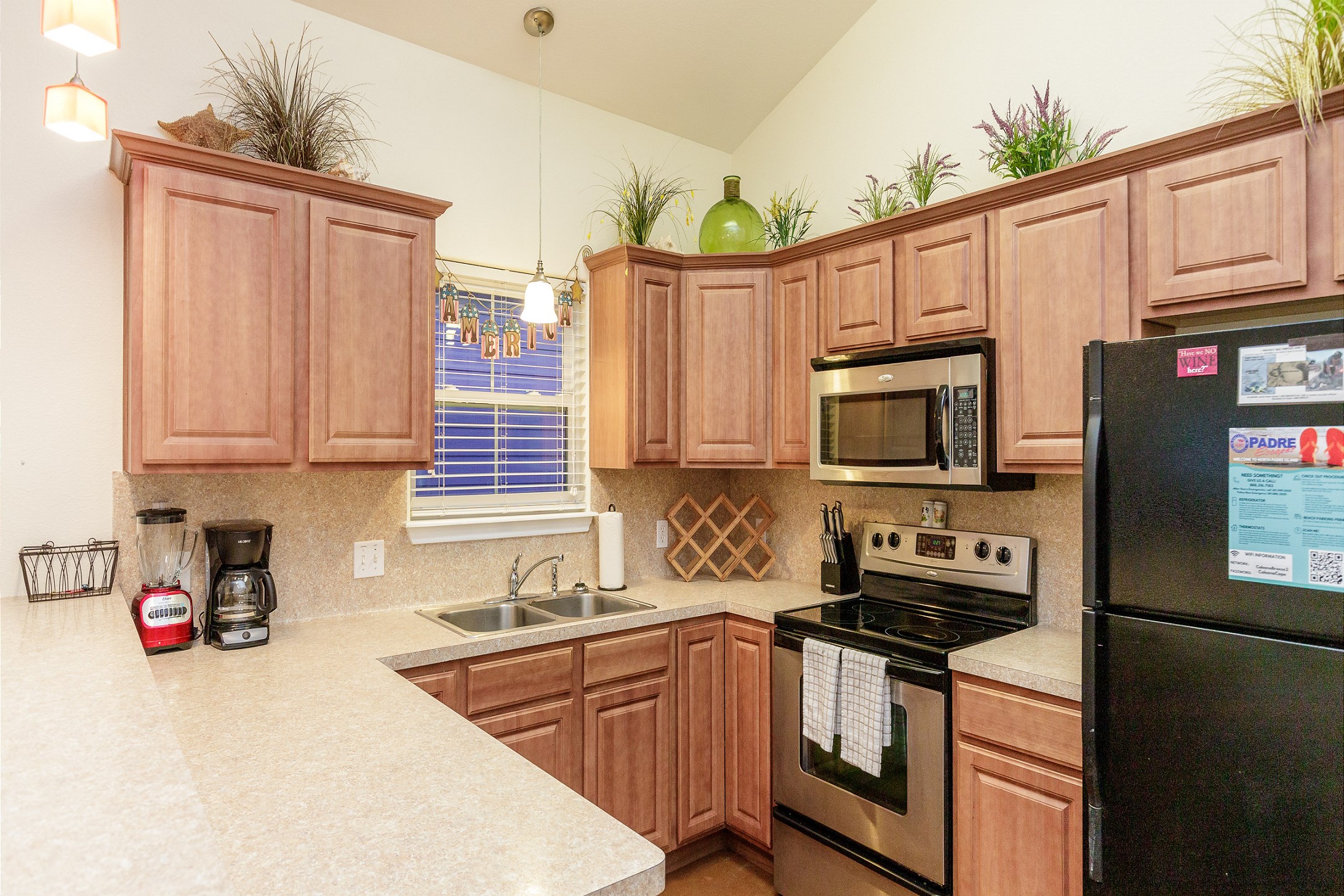 Well-equipped kitchen with stainless steel appliances 
