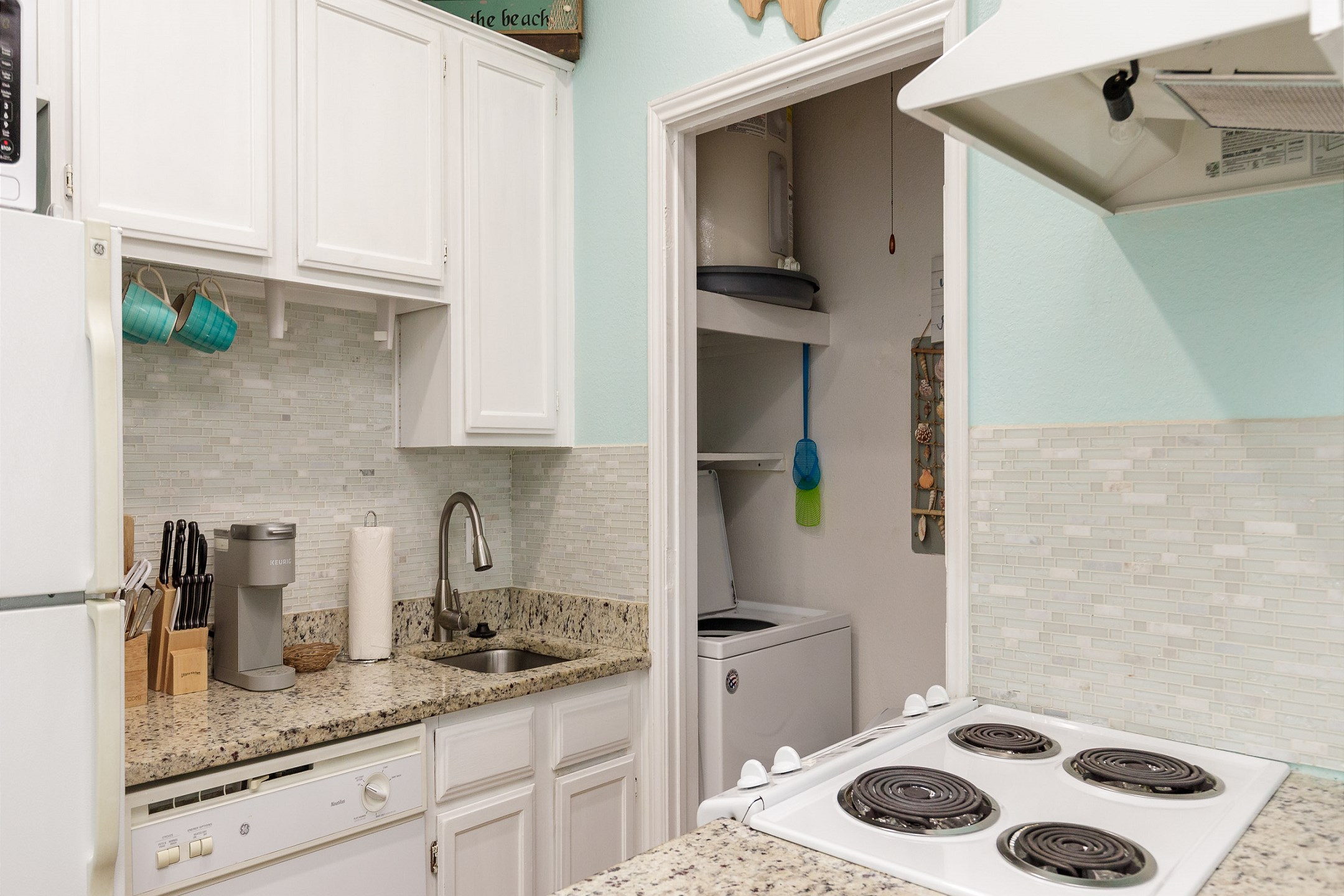 Fully equipped kitchen with everything you need, including a Keurig coffee maker
