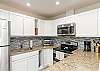 Newly remodeled kitchen with stainless steel appliances 