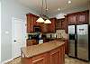 Fully equipped kitchen with ample storage and counter space