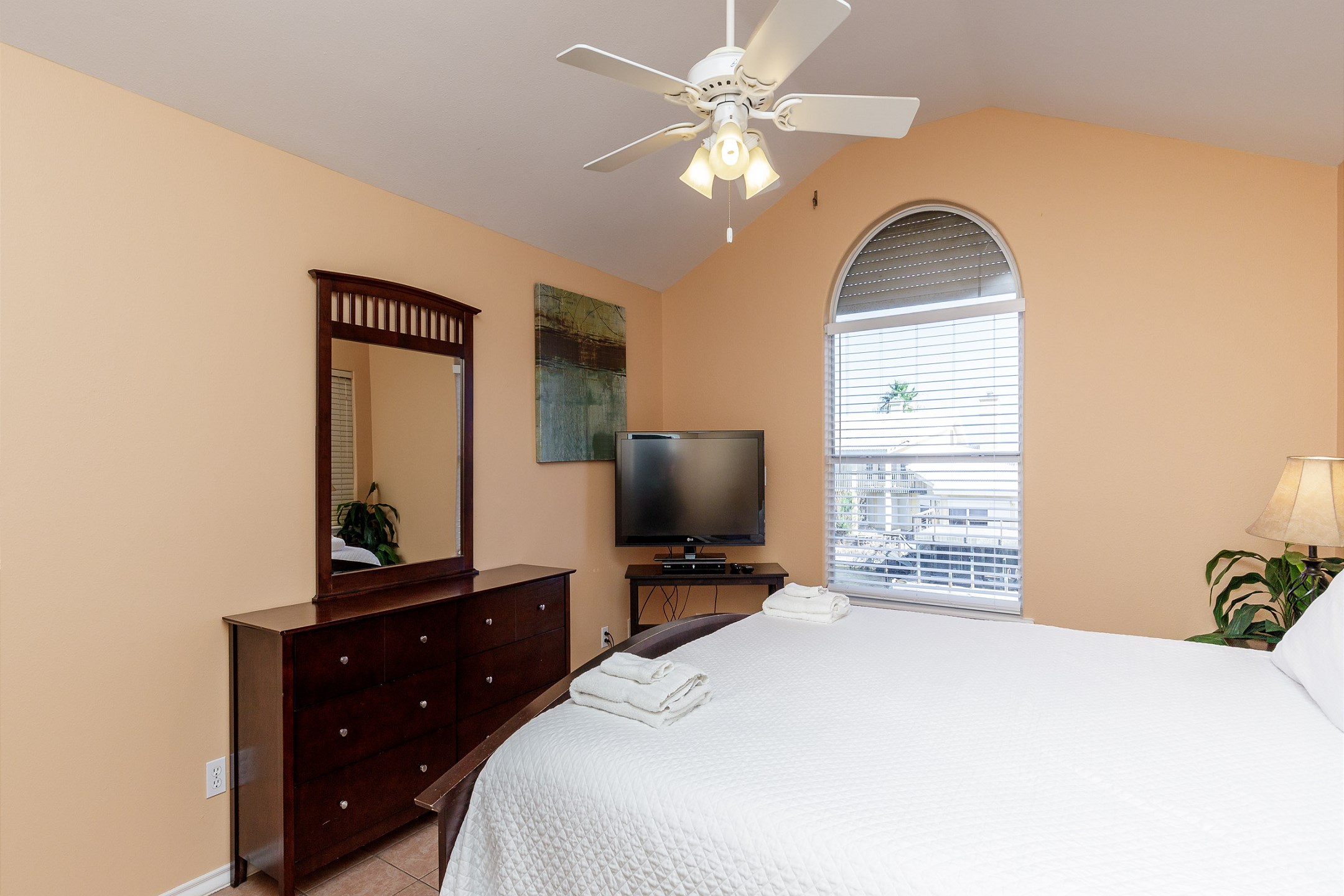 Master bedroom on the second floor with king size bed, private bathroom and flat screen TV