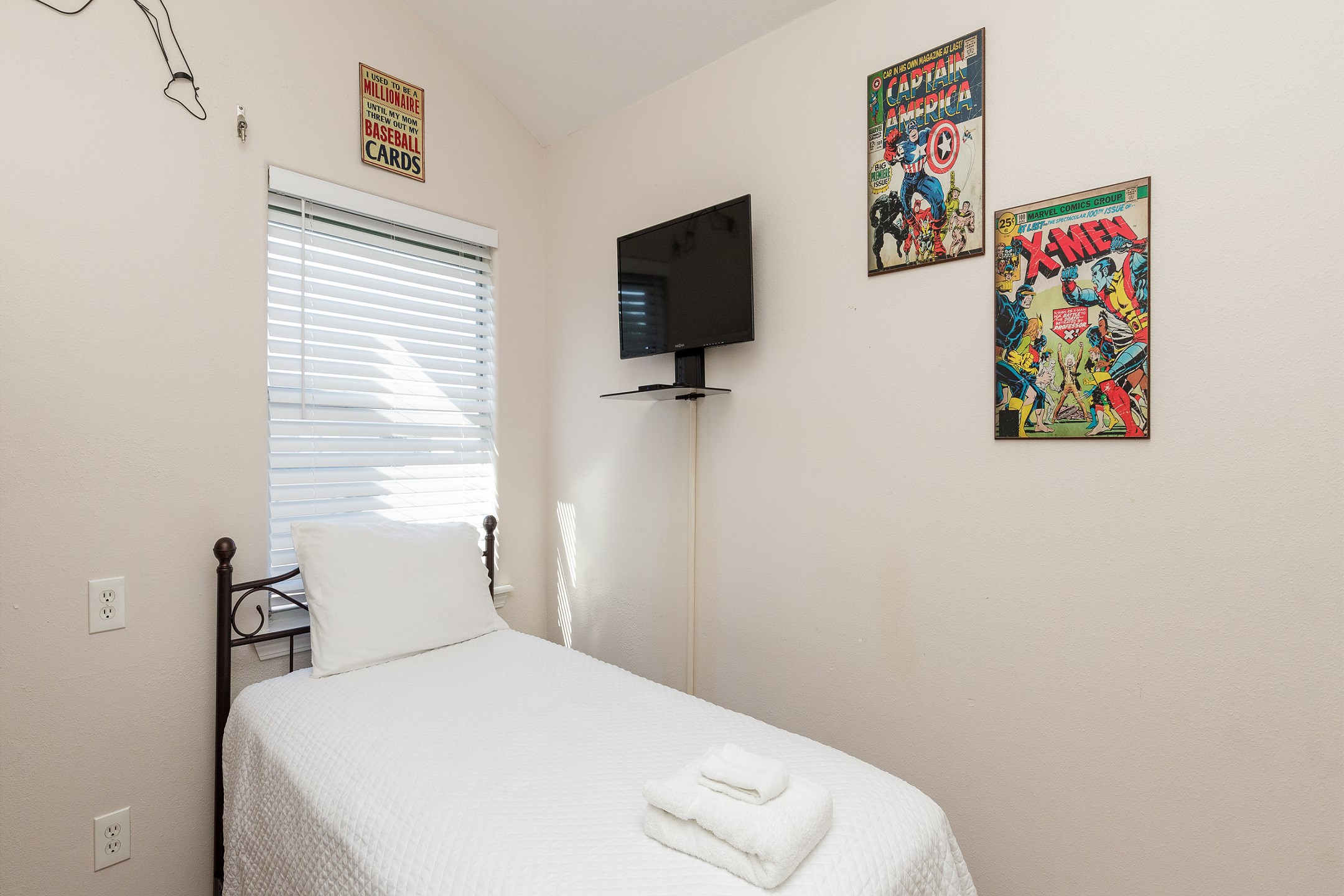 Fourth bedroom on the second floor with twin over twin size bunk beds and twin bed, along with flat screen TV