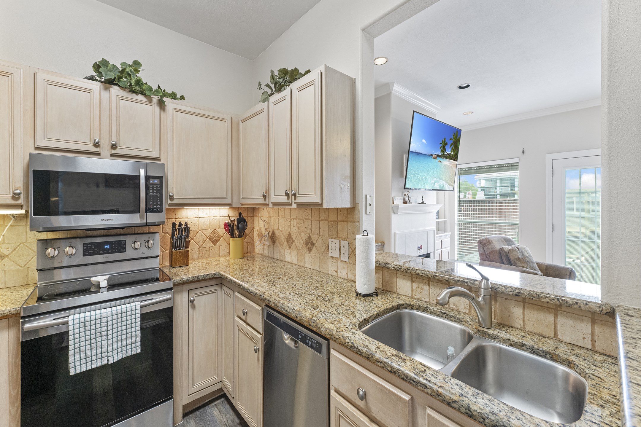 Beautiful kitchen area with plenty of counter space and storage