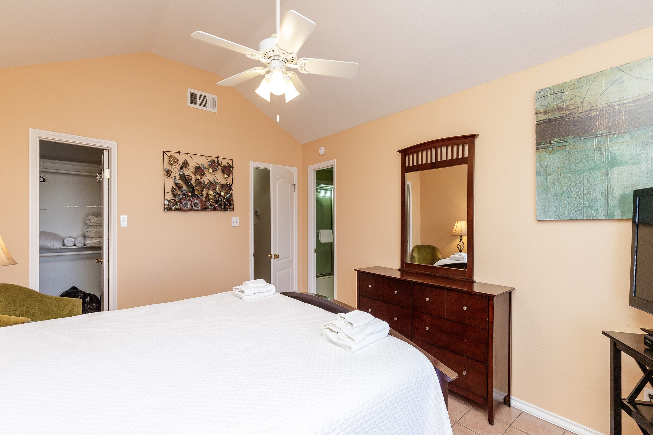 Master bedroom on the second floor with king size bed, private bathroom and flat screen TV