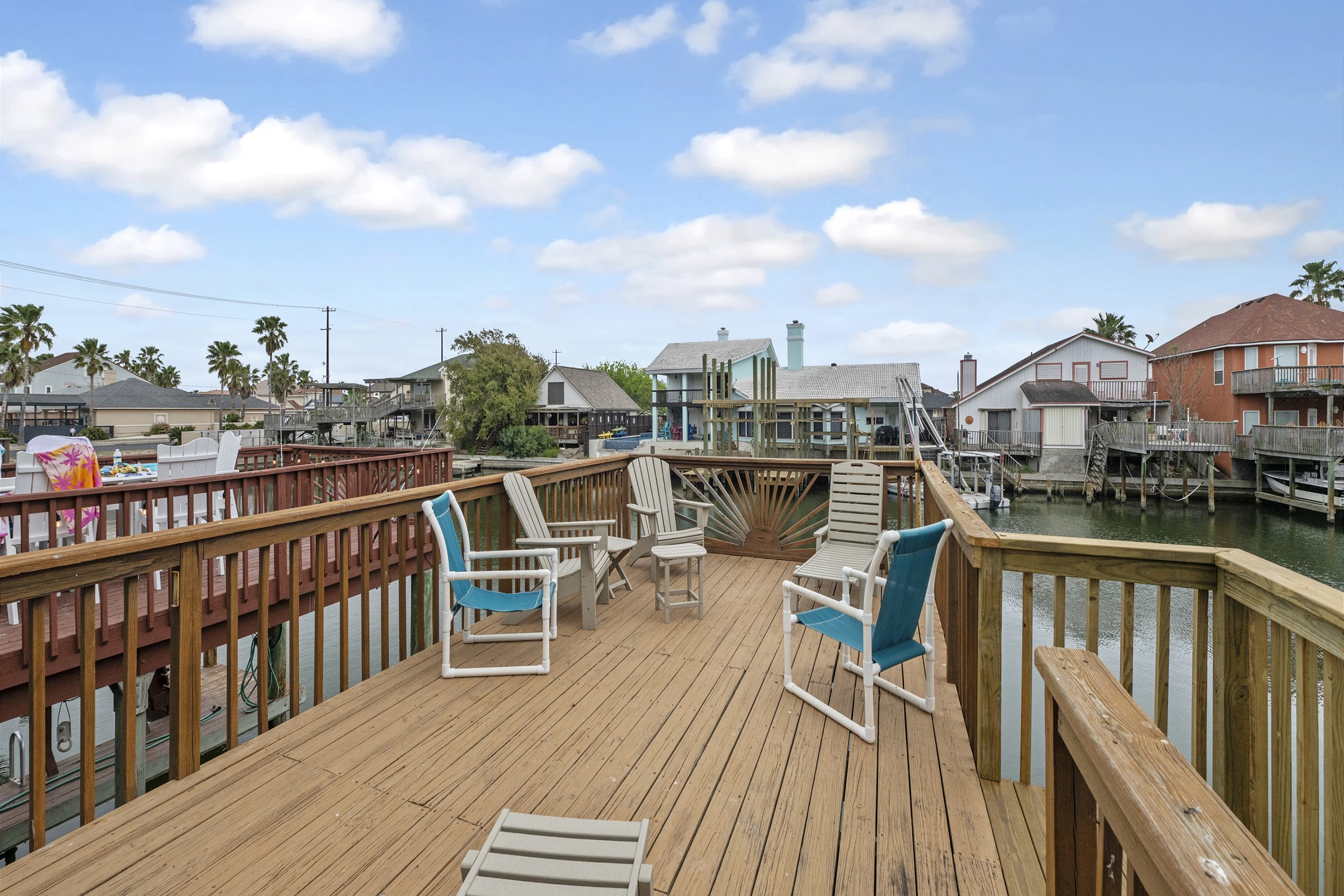 Great deck with cozy chairs to soak up the sun 