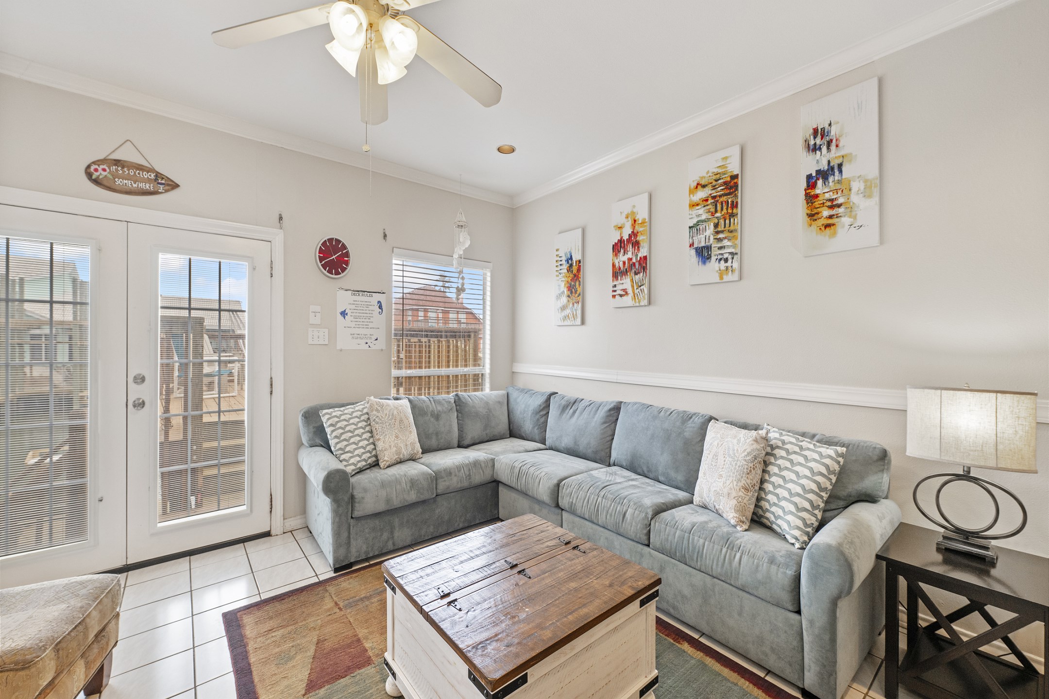 Cozy living area with queen size sleeper sofa and access to the private sundeck