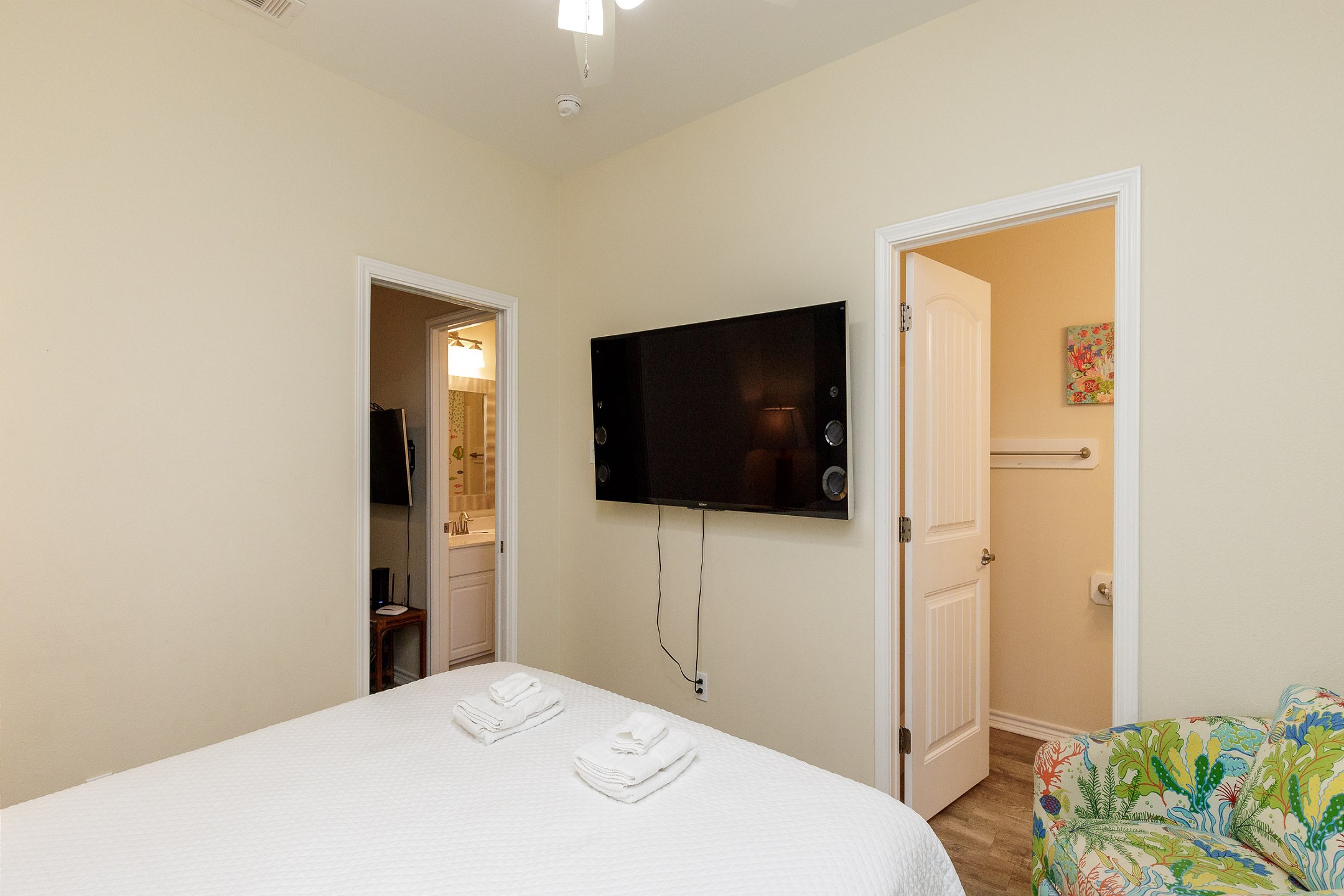 Second bedroom on the second floor with king size bed, private bathroom and flat screen TV