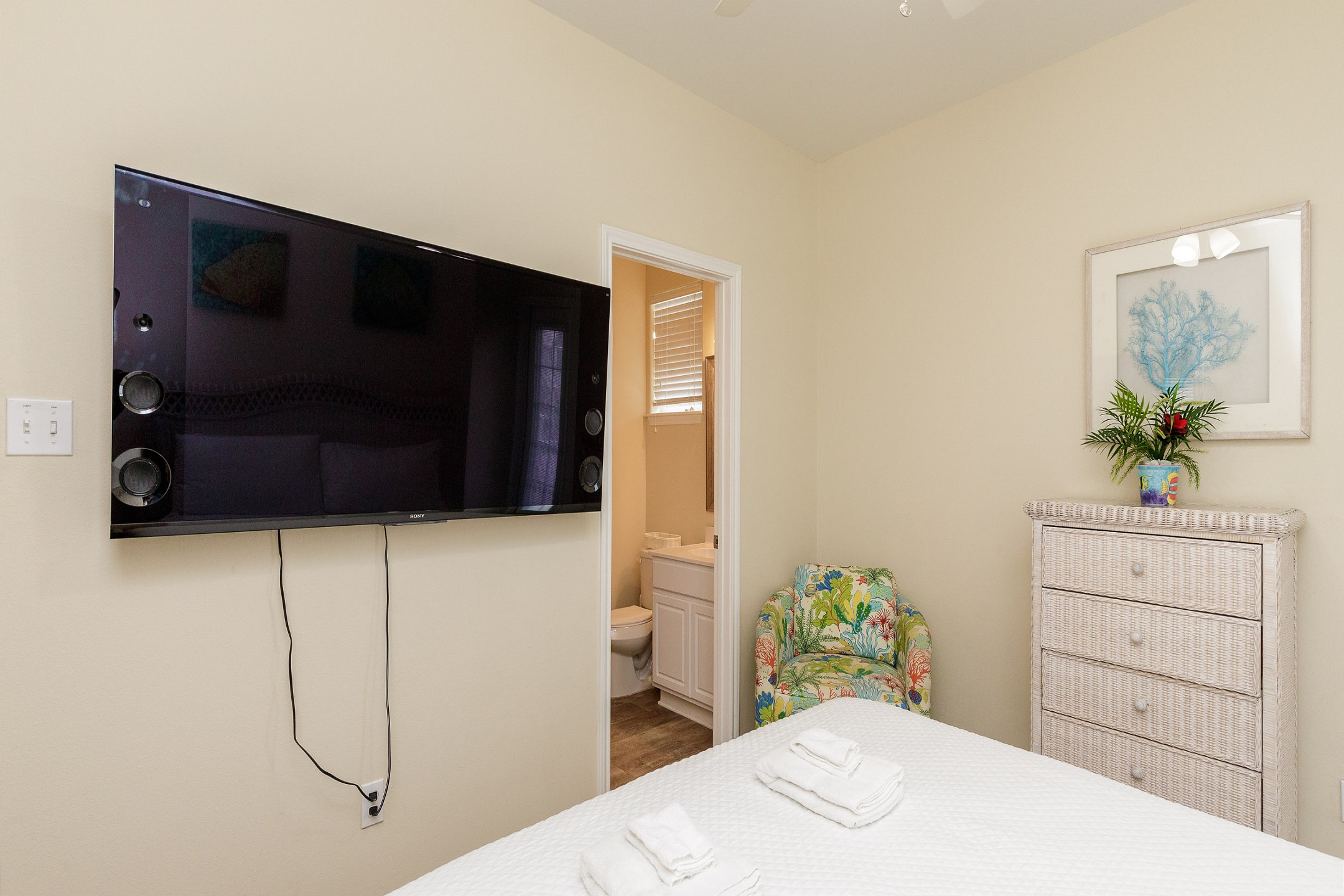 Second bedroom on the second floor with king size bed, private bathroom and flat screen TV