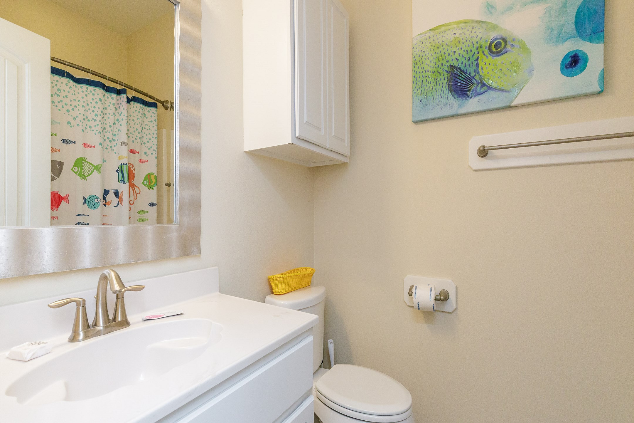 Guest bathroom on the second floor with a sink, toilet, and tub/shower combo