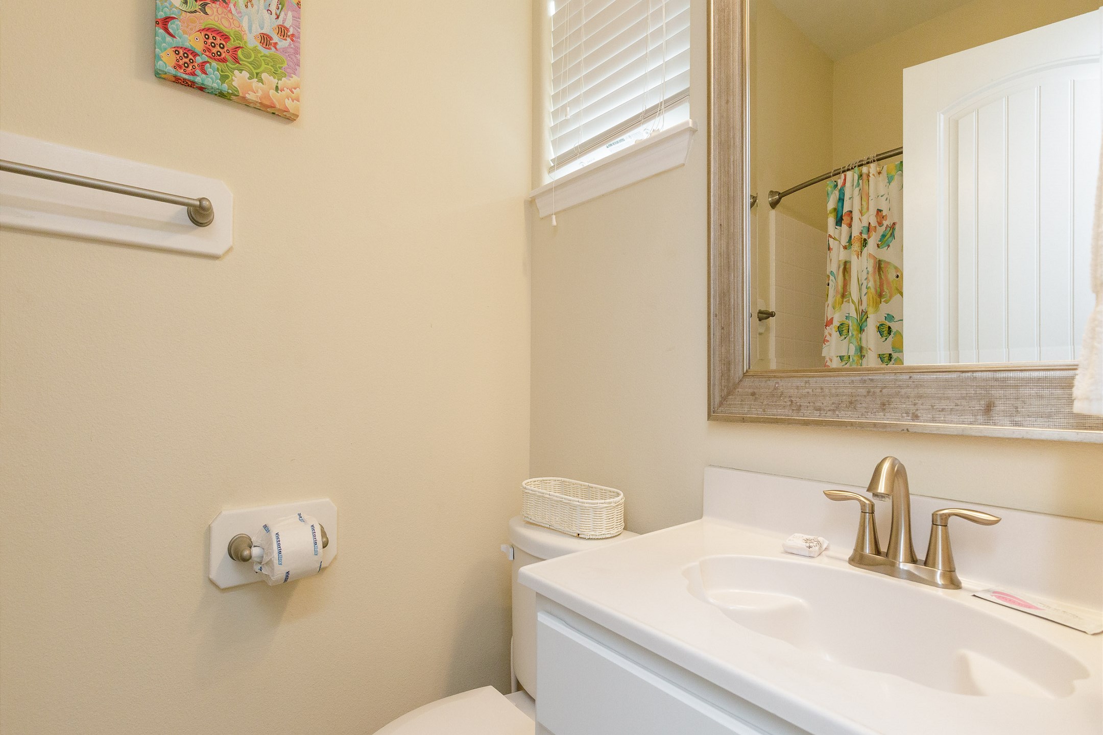 Private bathroom off the second bedroom with walk in shower
