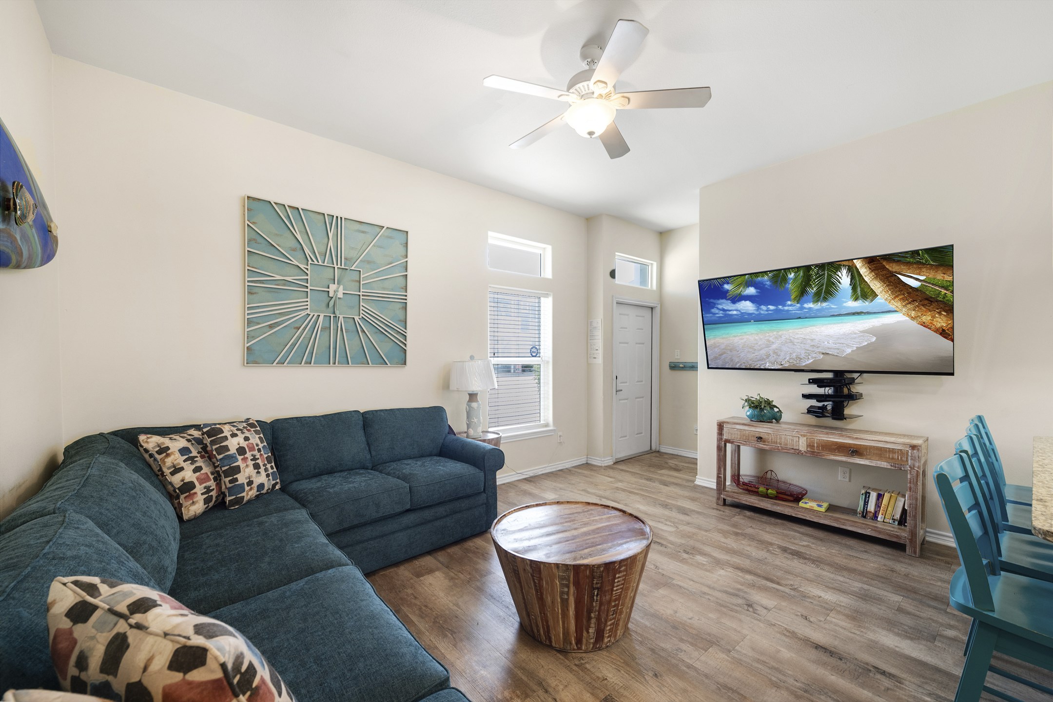 Family-friendly living area with a queen sleeper sofa and a flat-screen TV for endless entertainment