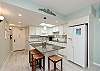 Fully equipped kitchen with updated counter space and breakfast Island that seats four 