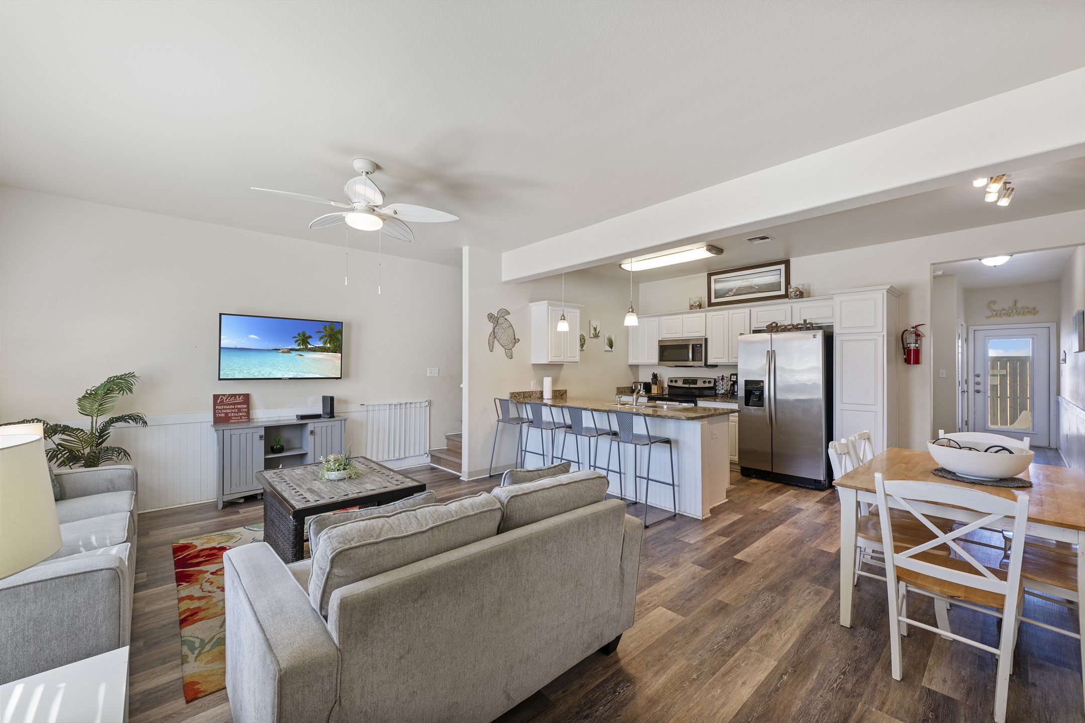 Stylish living spaces with modern furnishings, flat-screen TV, and streaming services