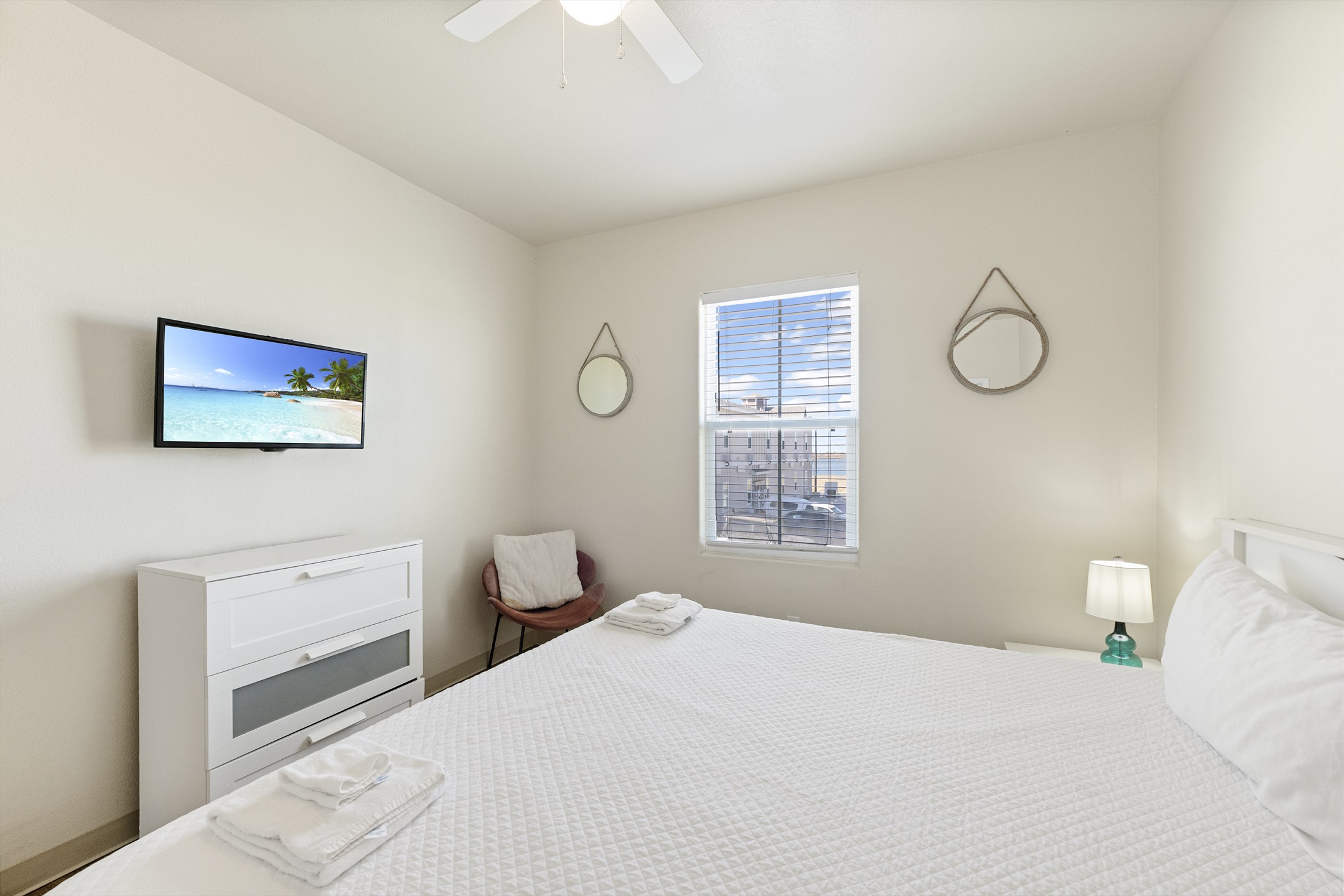 Second bedroom on the second floor with king size bed and flat screen TV