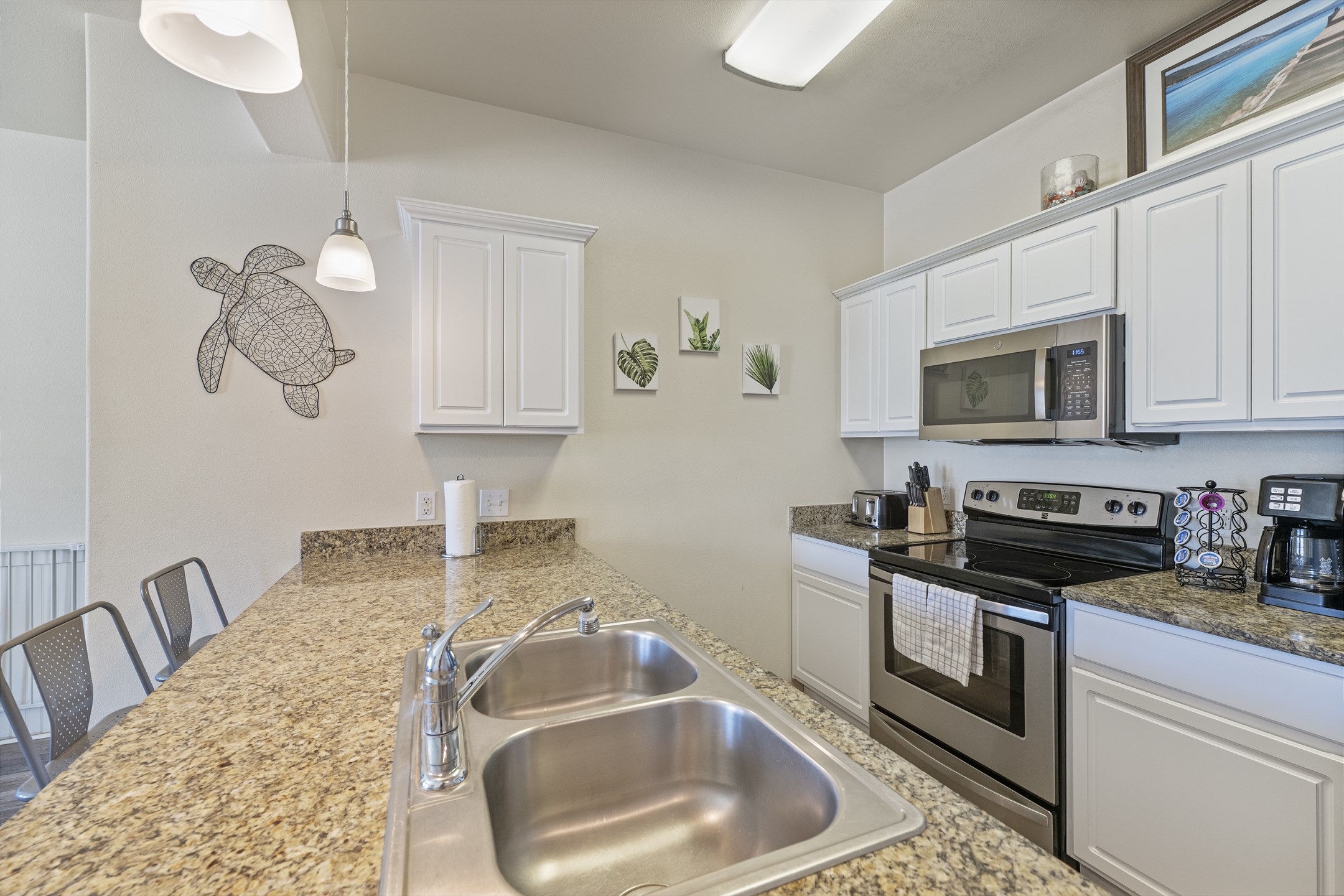 Fully equipped kitchen with stainless steel appliances, coffee maker, toaster and cookware (K-cups not included)