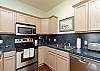 Fully equipped kitchen with 12-cup coffee maker and ample counter space