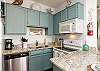 Beautiful kitchen area with updated cabinets and appliances 