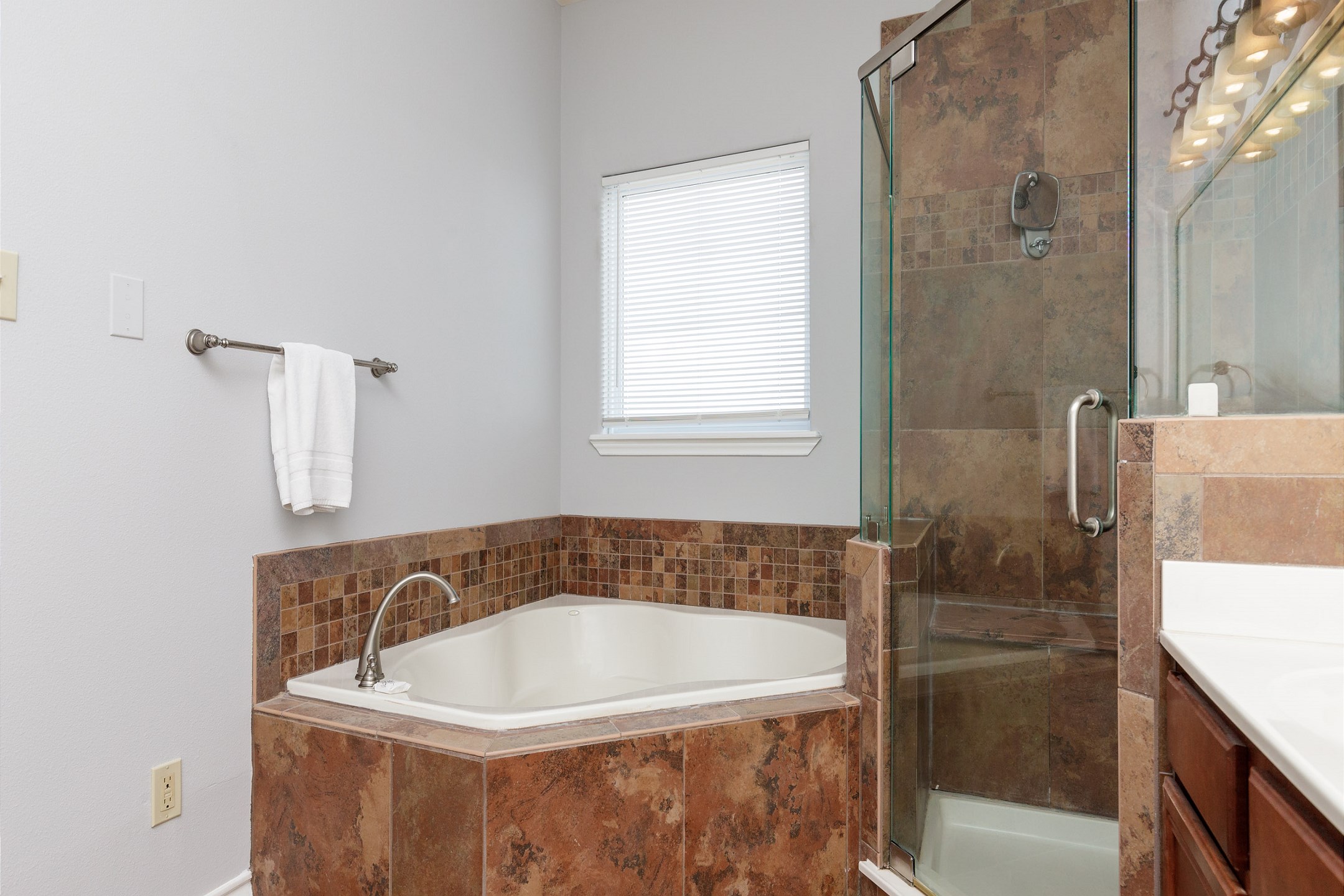 Master bathroom with double sinks, garden tub and walk in shower 