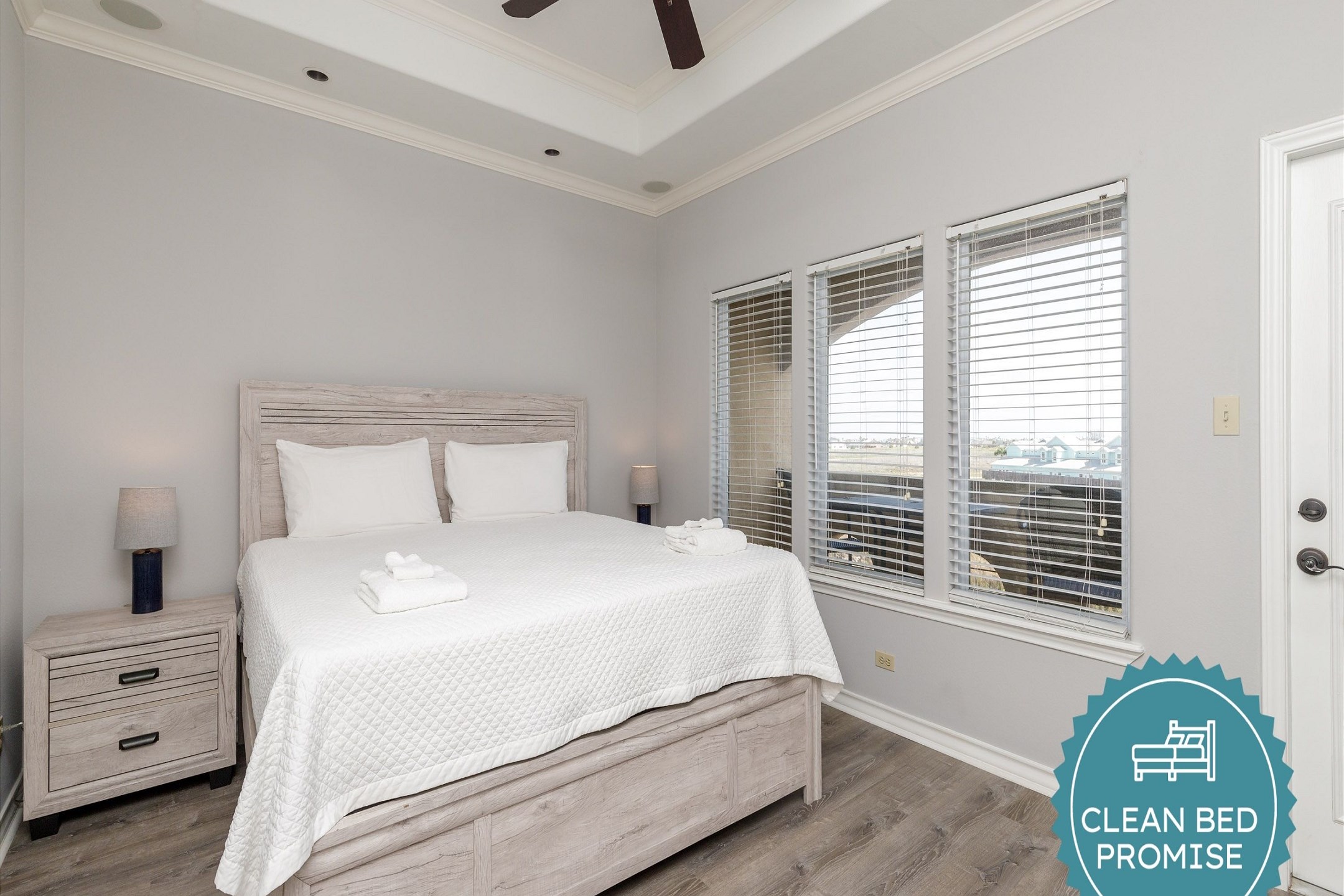 Master bedroom on the third floor with king size bed, private balcony, private bathroom and walk in closet