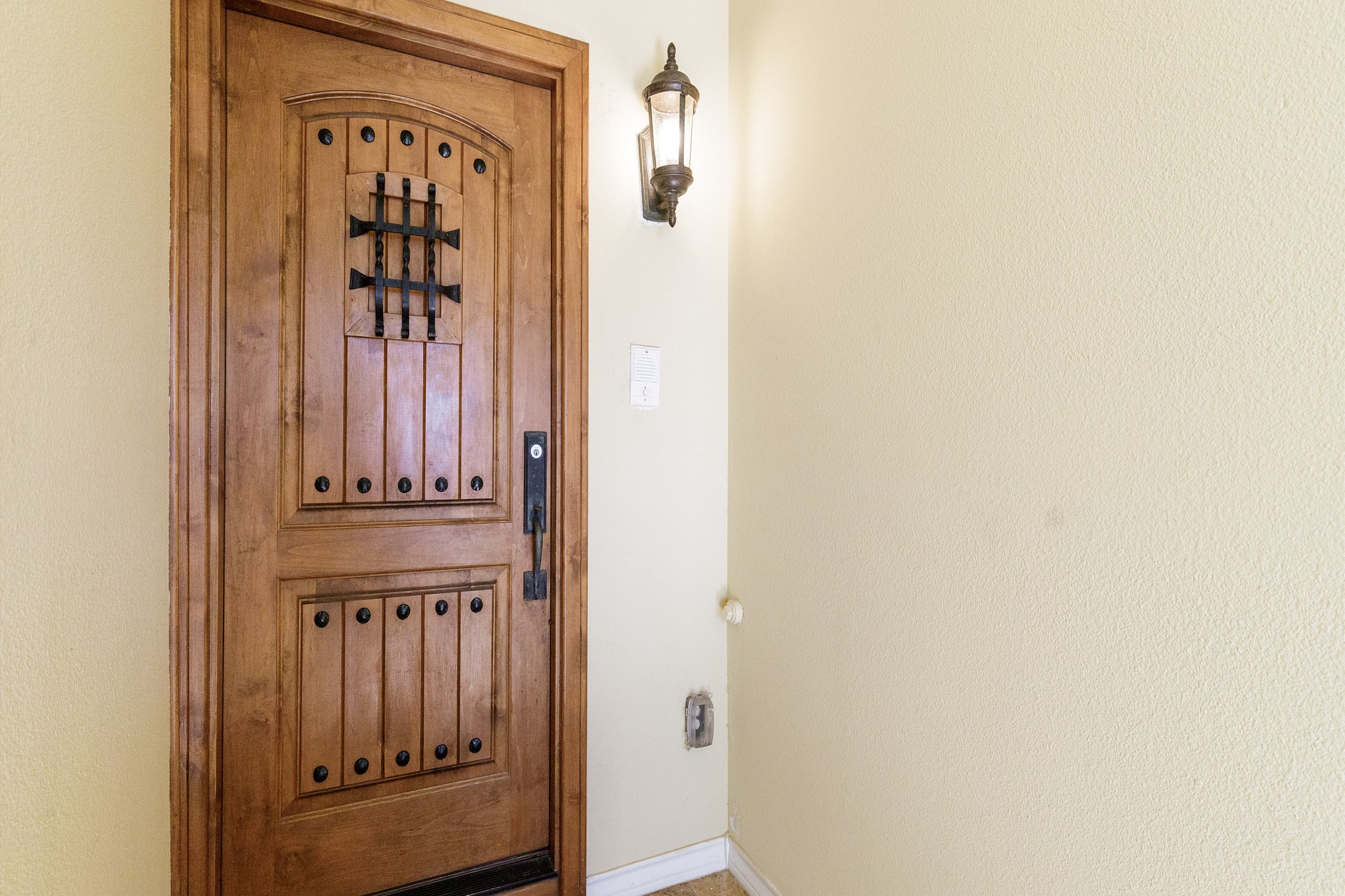 Front door entrance on the second floor with coded lock for extra security 