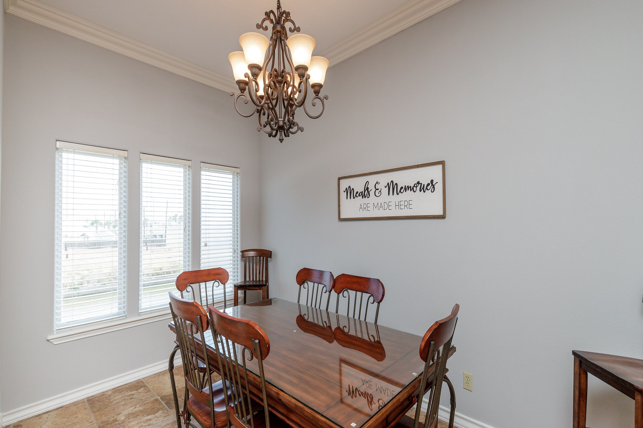 Dining table with seating for six to enjoy family meals or game night together