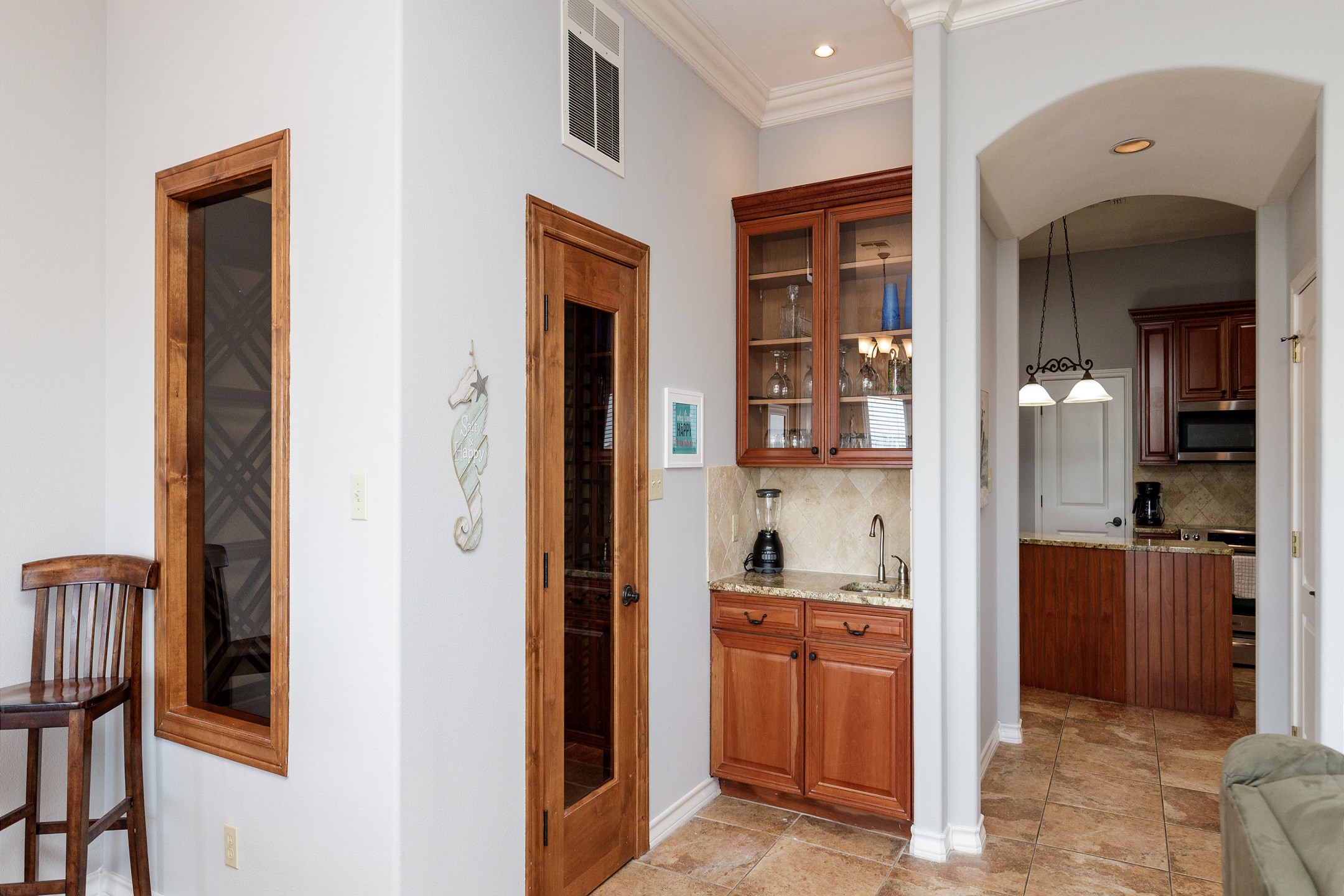 Open concept living space with bar area 