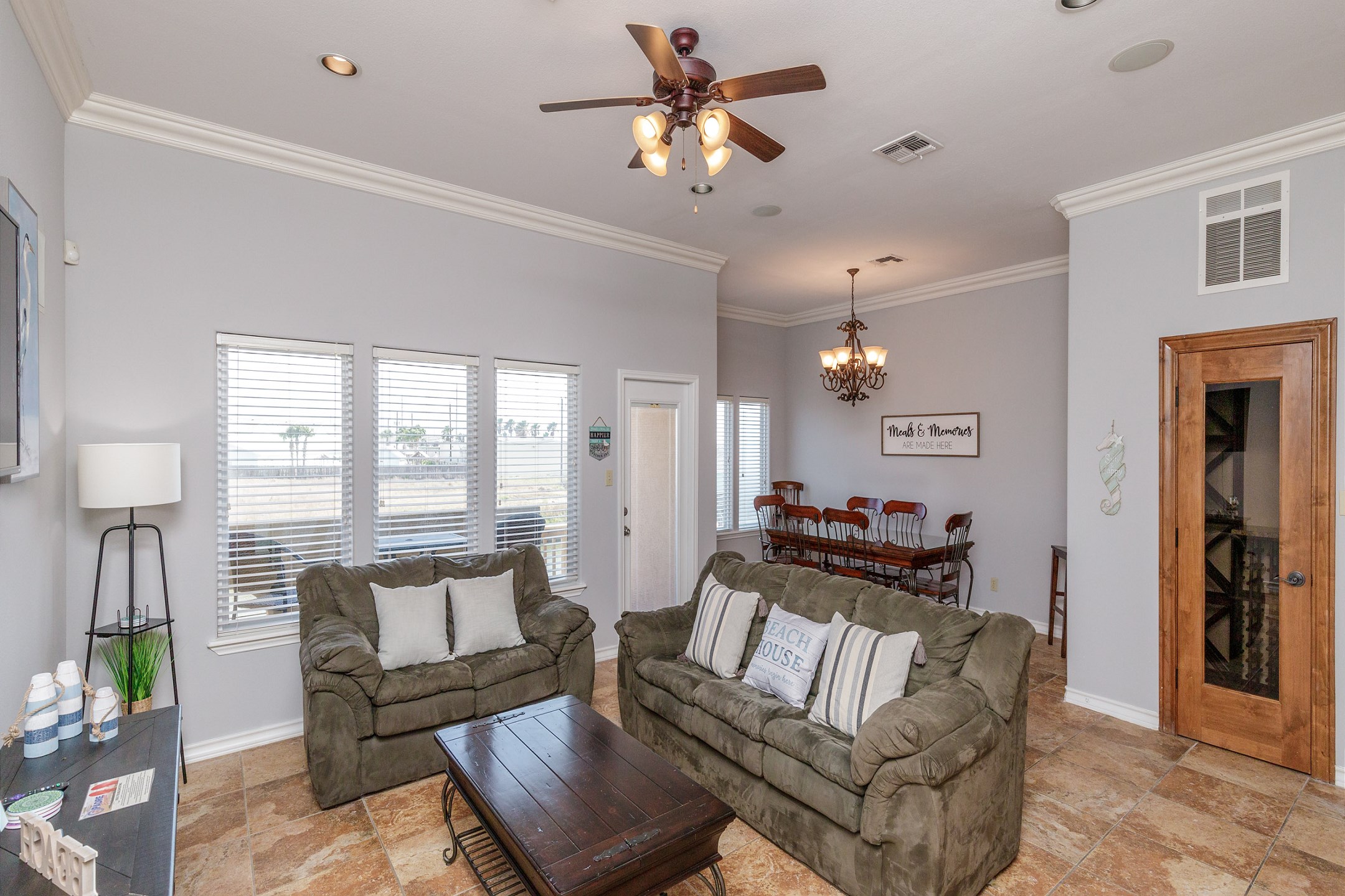 Spacious living area with updated furnishings and unique decor through out 