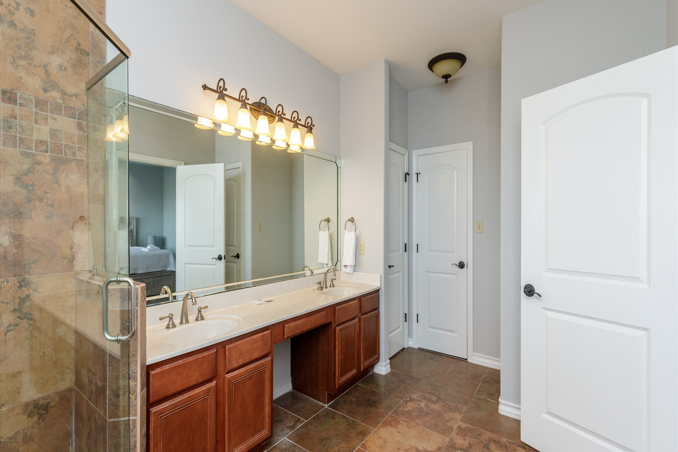 Master bathroom with double sinks, garden tub and walk in shower 