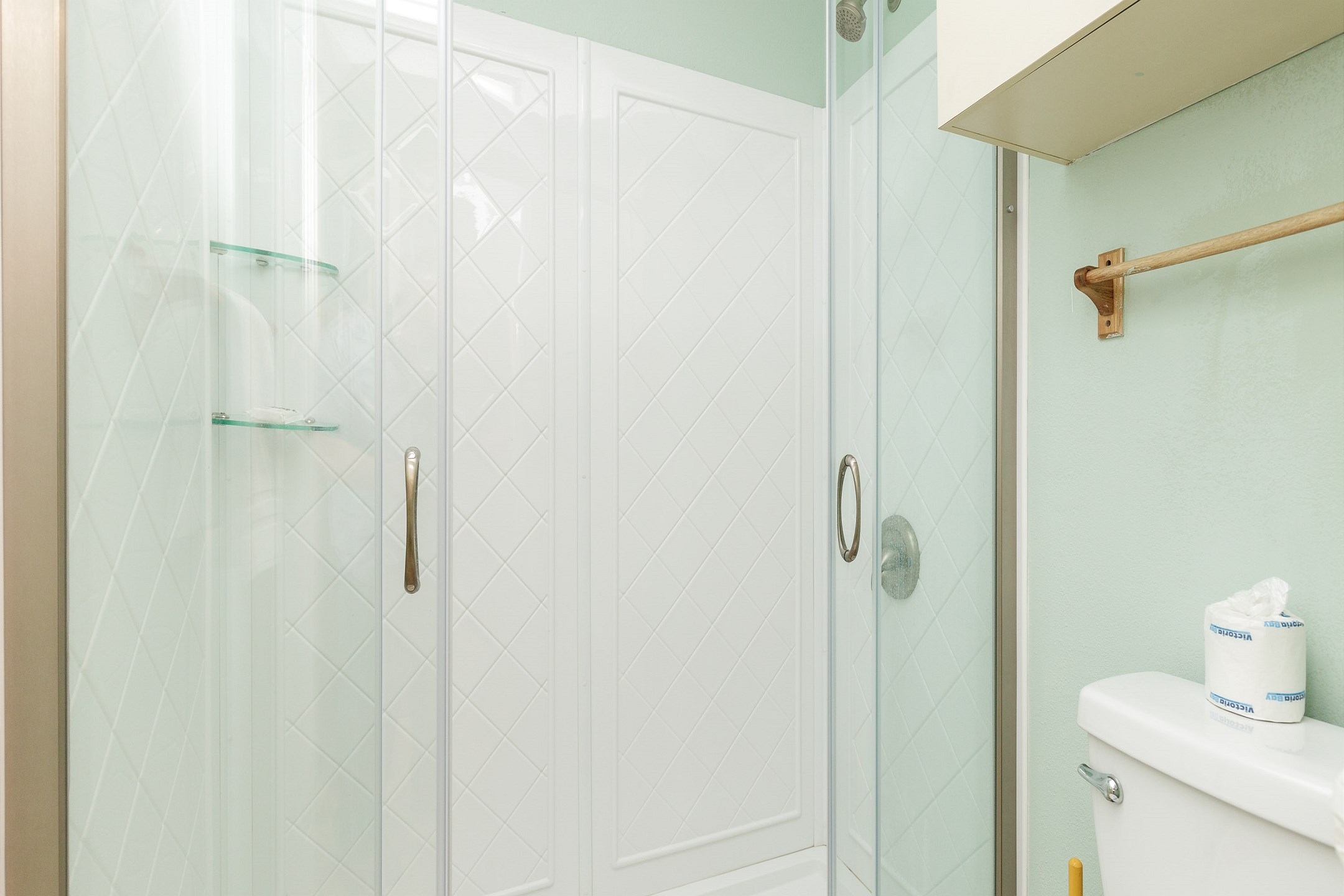 Guest bathroom on the second floor with low threshold walk-in shower
