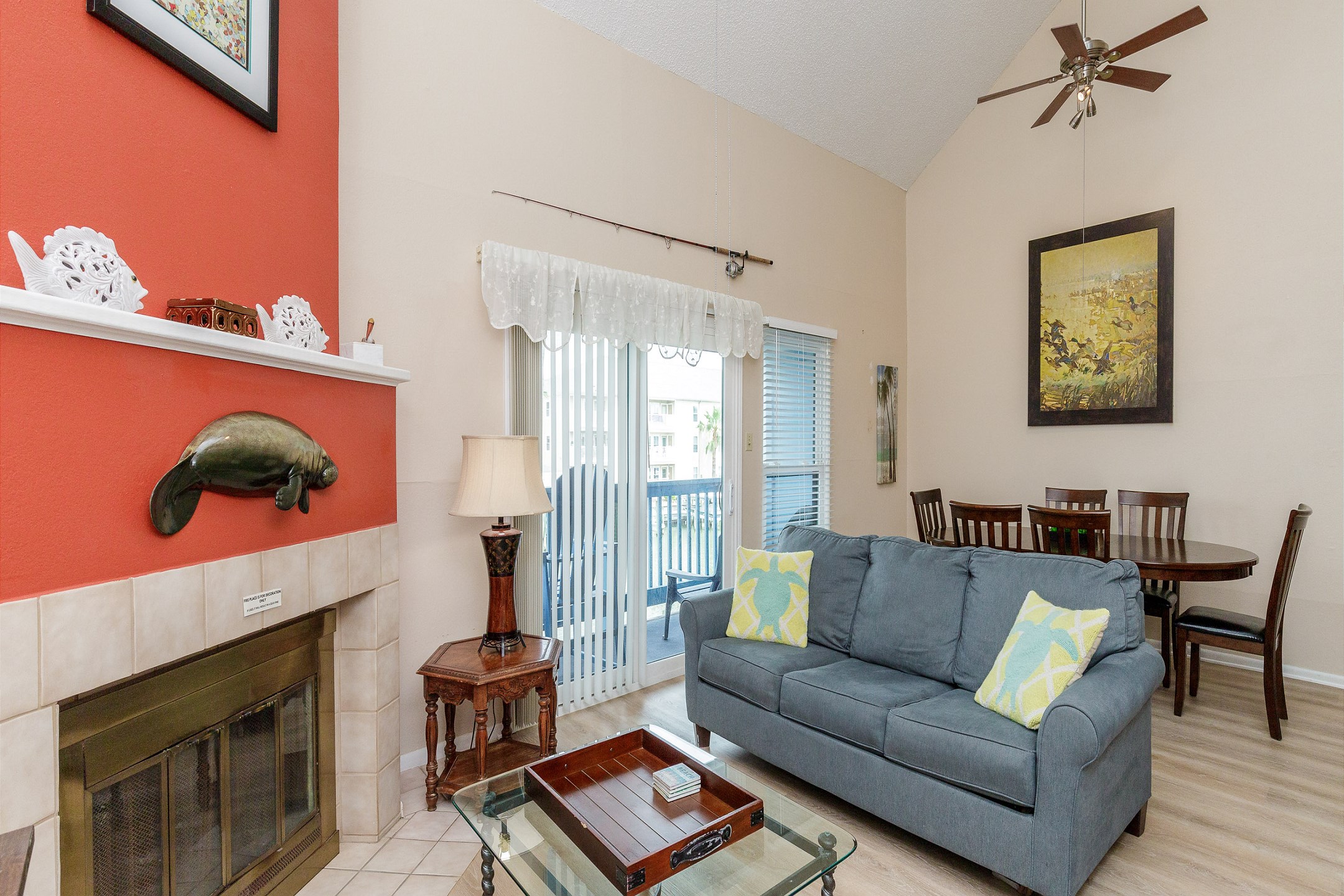 Spacious living area with queen size sleeper sofa and private balcony 