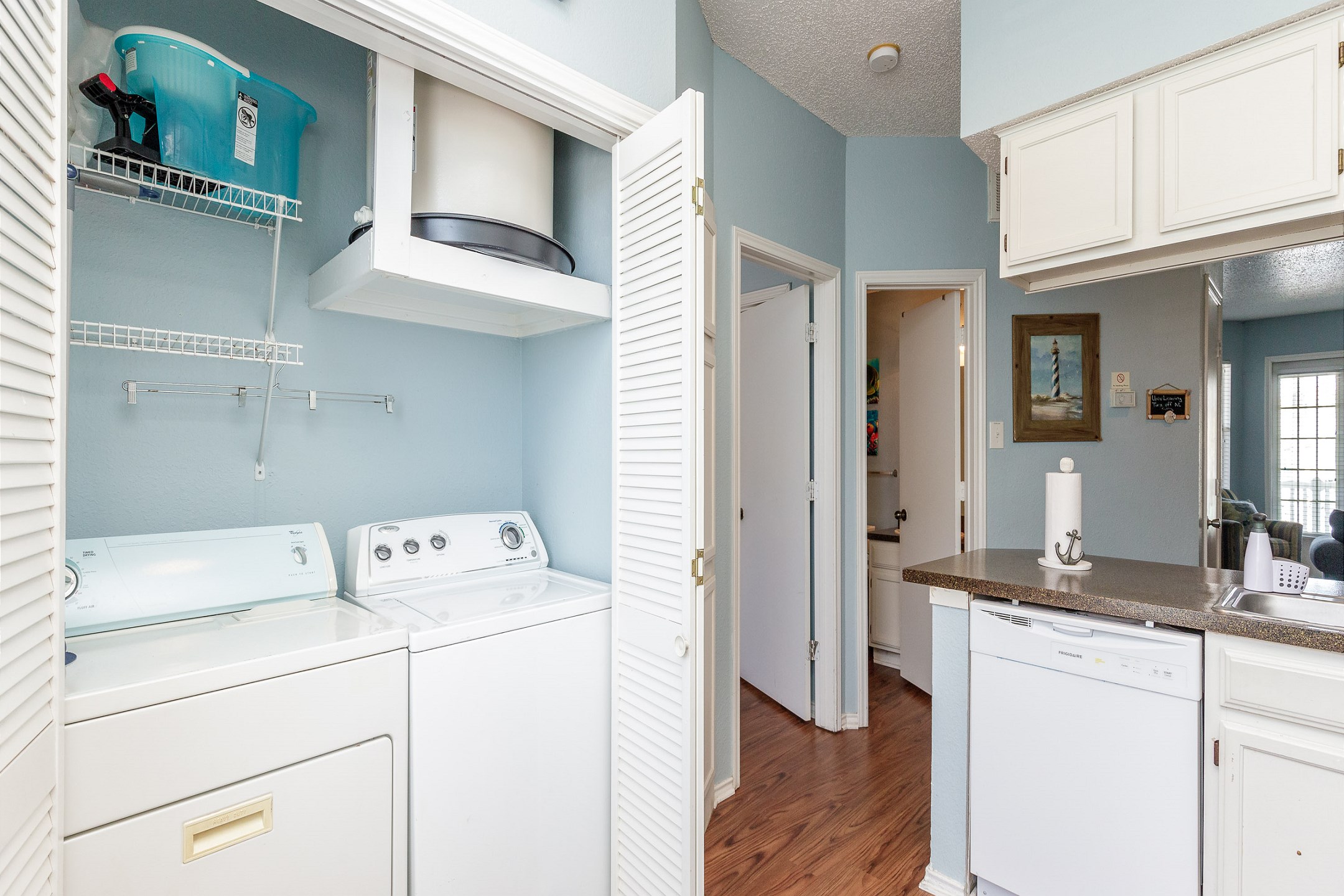 Convenient kitchen area with an in-unit washer and dryer for added ease during your stay