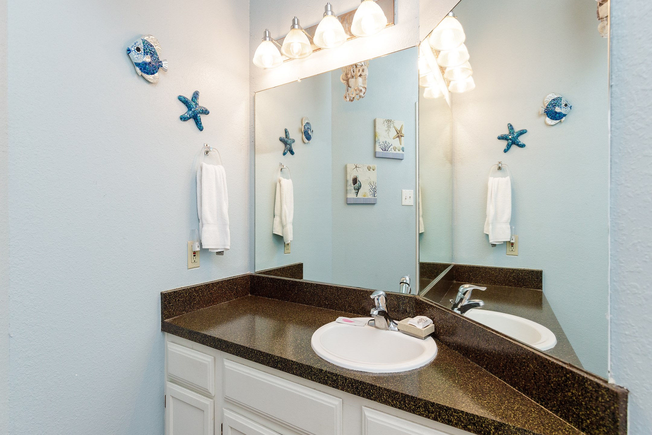 Guest bathroom with tub and shower 