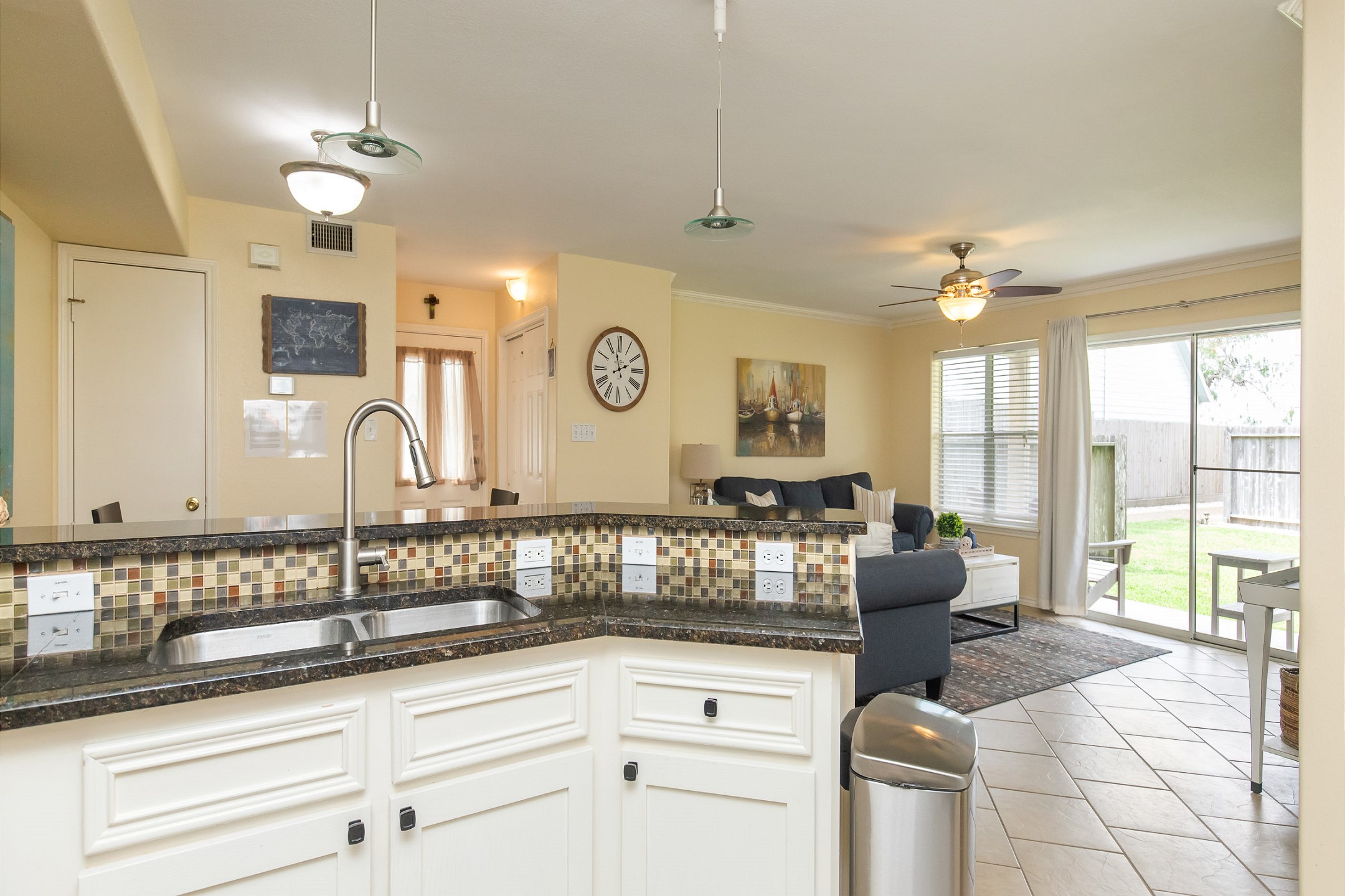 Open kitchen space with coastal features throughout 