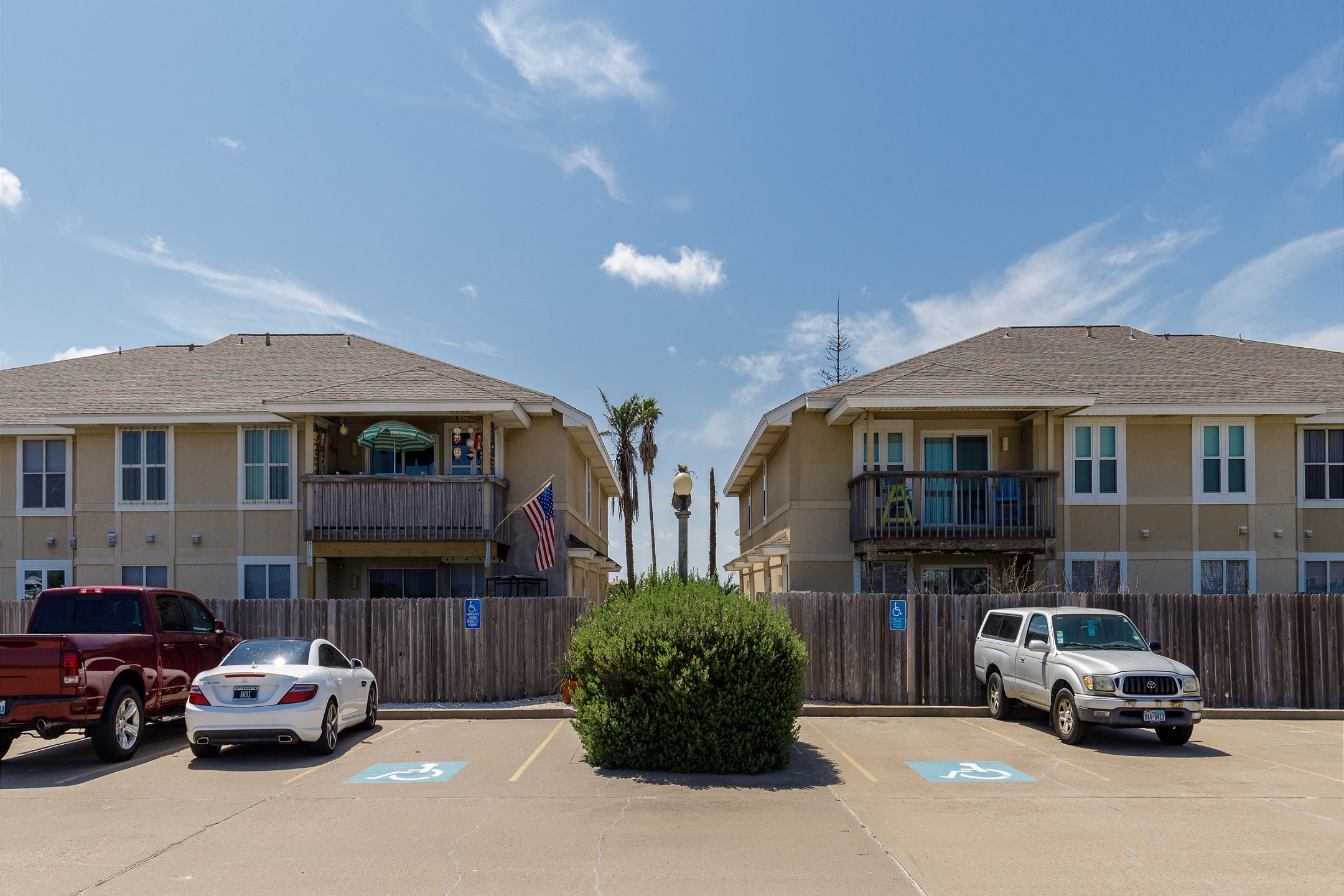 Parking lot at Lakeshore Villas, entrance to unit #23 will be the walkway to the left
