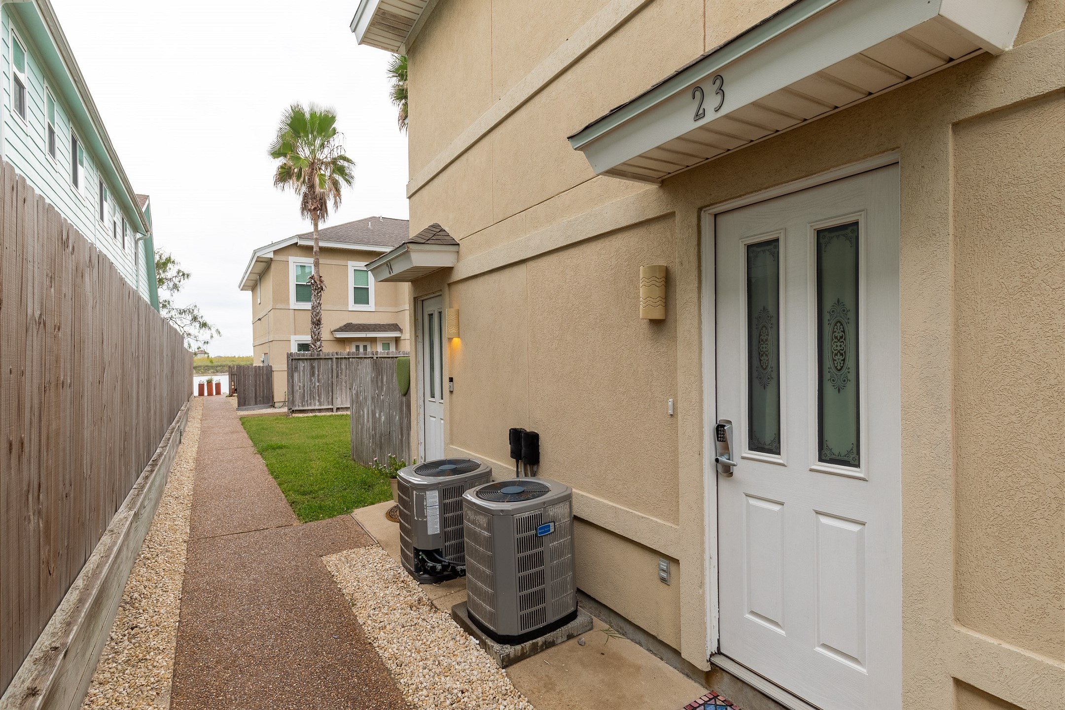 Exterior entrance to property, #23 with coded lock for extra security 