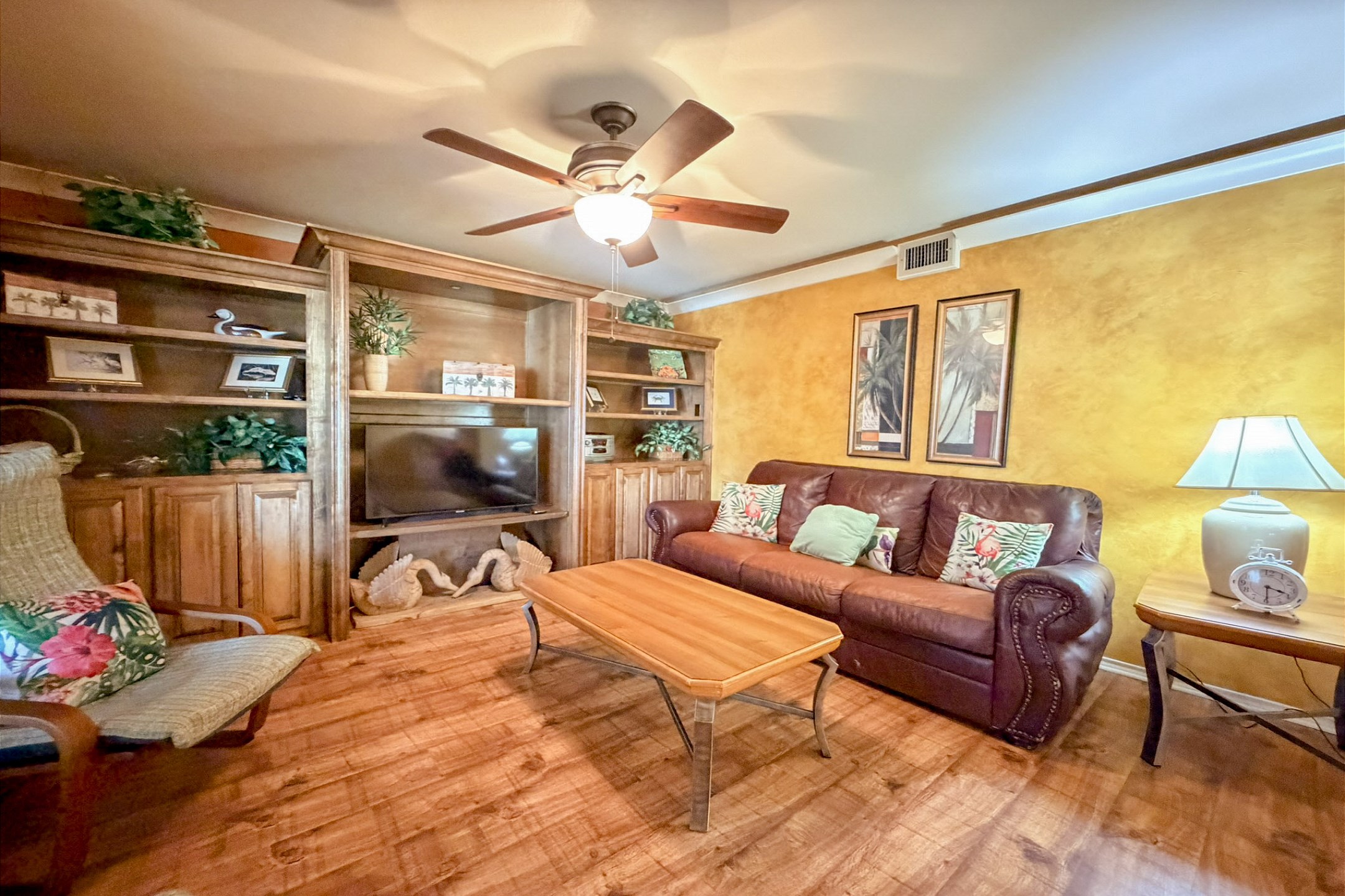 Spacious and cozy living room perfect for relaxation with a flat screen TV