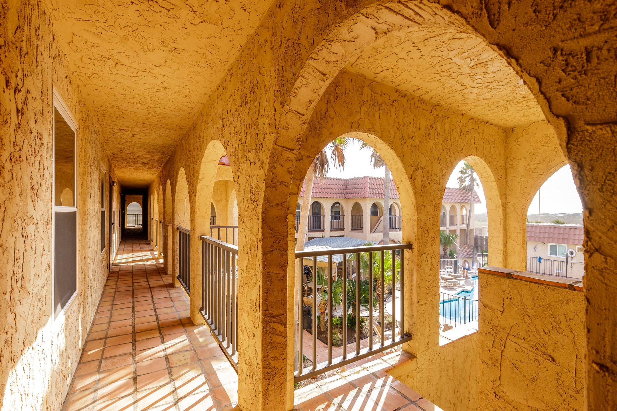 Welcome to Seahorse #206, a second-floor condo just steps from beach access for the ultimate coastal getaway