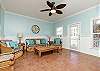 Great living area with plenty of seating and private balcony 