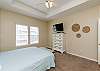 Master bedroom with king size bed and flat screen TV