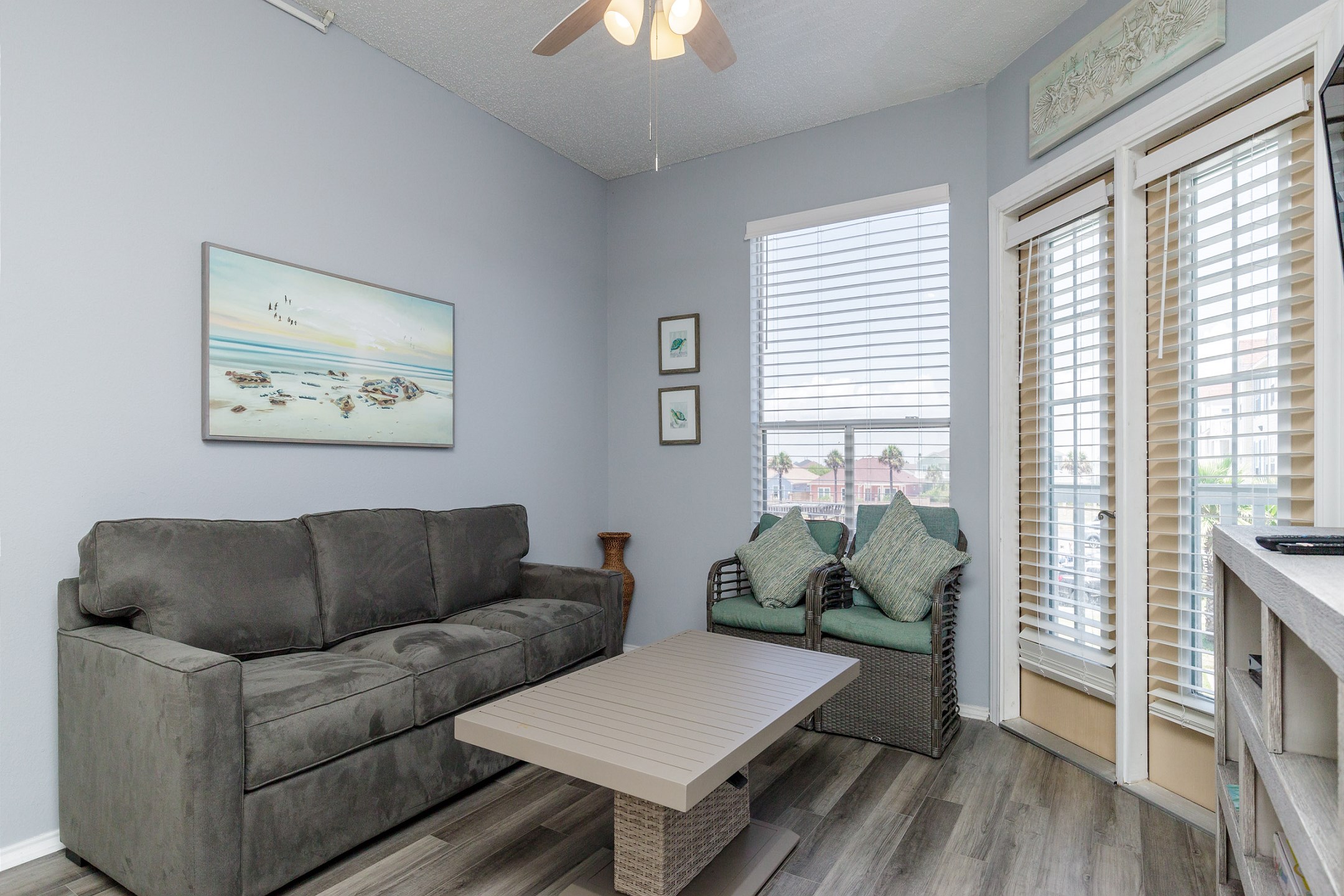 Newly updated living space with cozy furniture and decor 