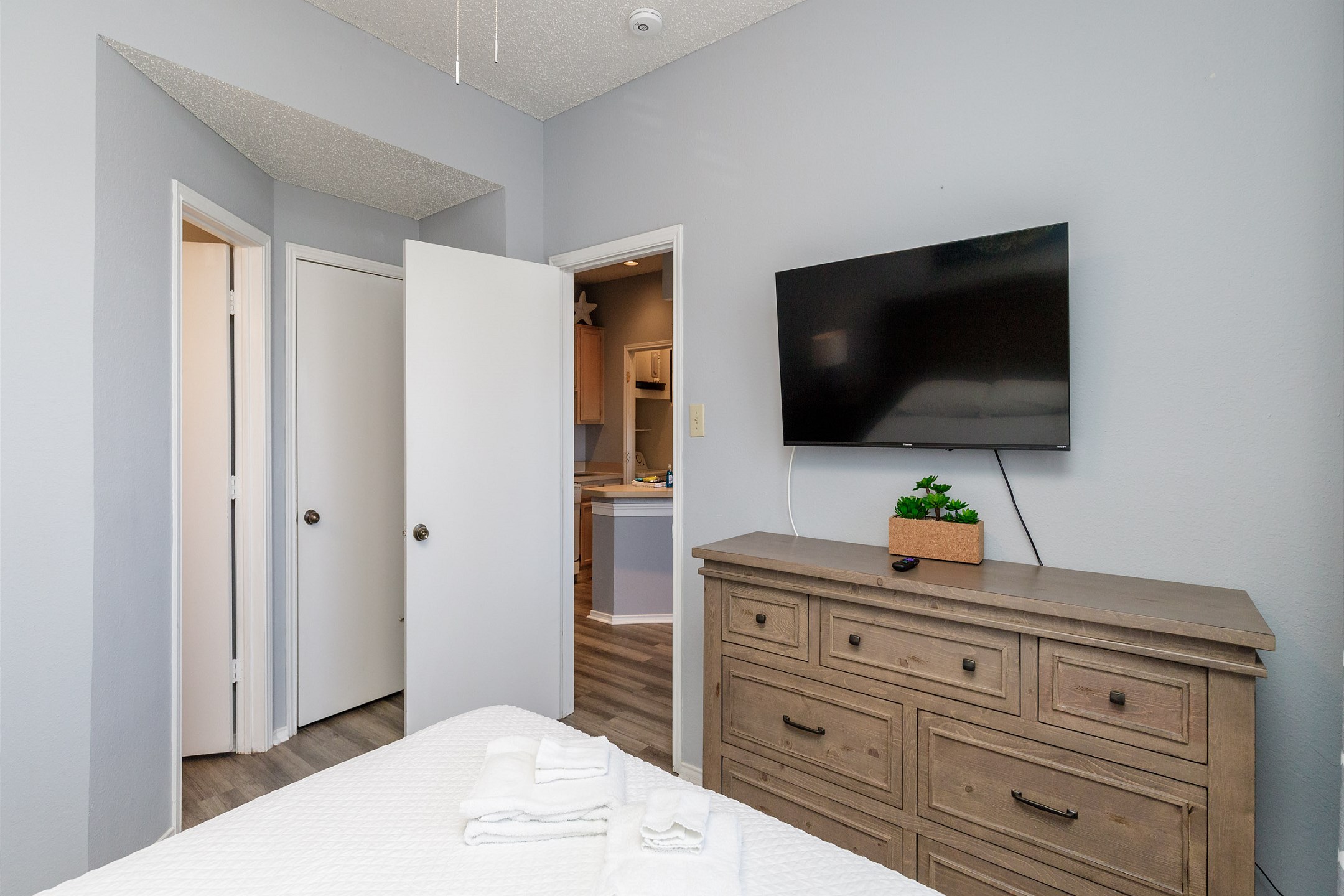 Master bedroom with queen size bed and flat screen TV