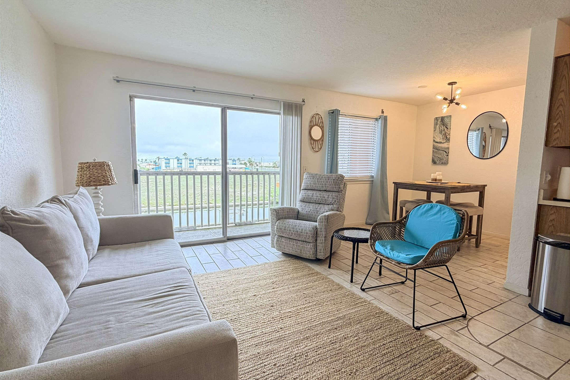 Living space with full size sleeper sofa and comfortable seating for family gatherings
