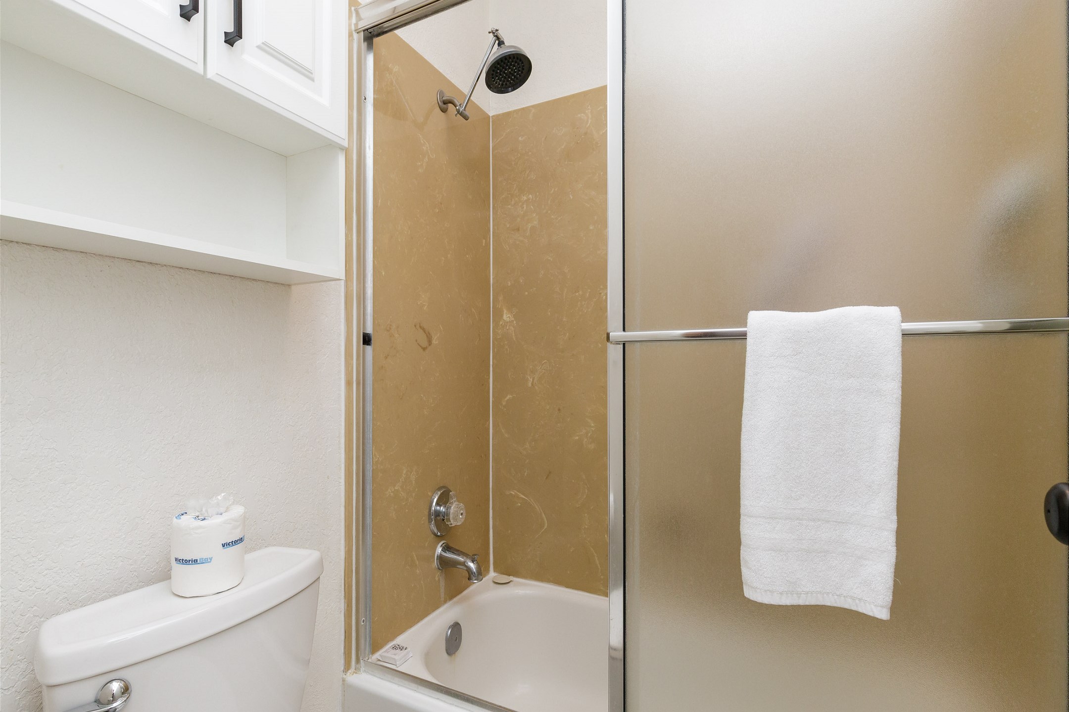 Guest bathroom with separate sink area and tub/shower combo