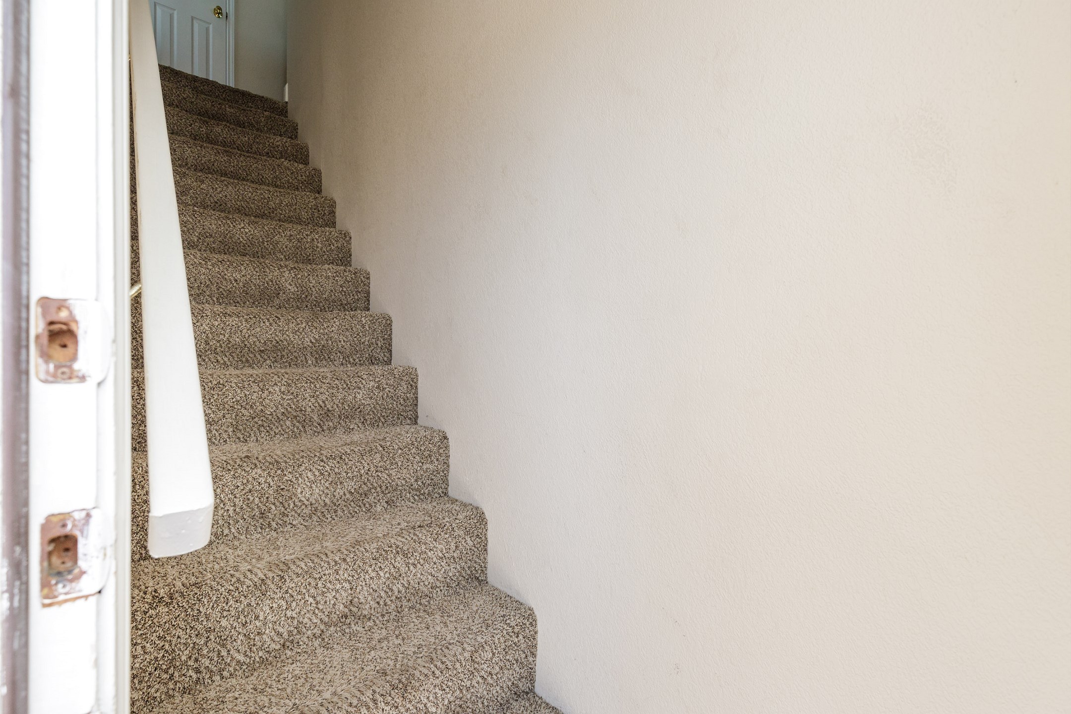 Enter on the ground level and head upstairs to the main living area