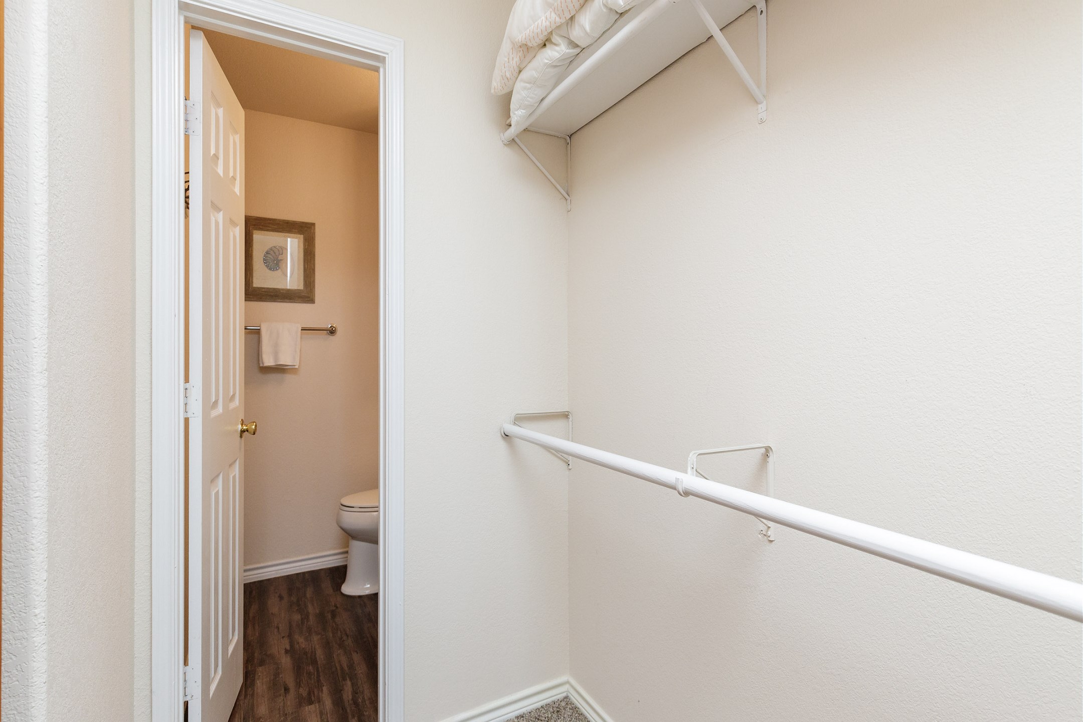 Master bedroom with walk in closet and private bathroom