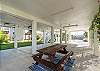 Carport area with ample space and picnic table to enjoy the Texas breeze