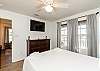Second bedroom with queen size bed and flat screen TV
