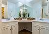 Master bathroom with double sinks, tub and shower 